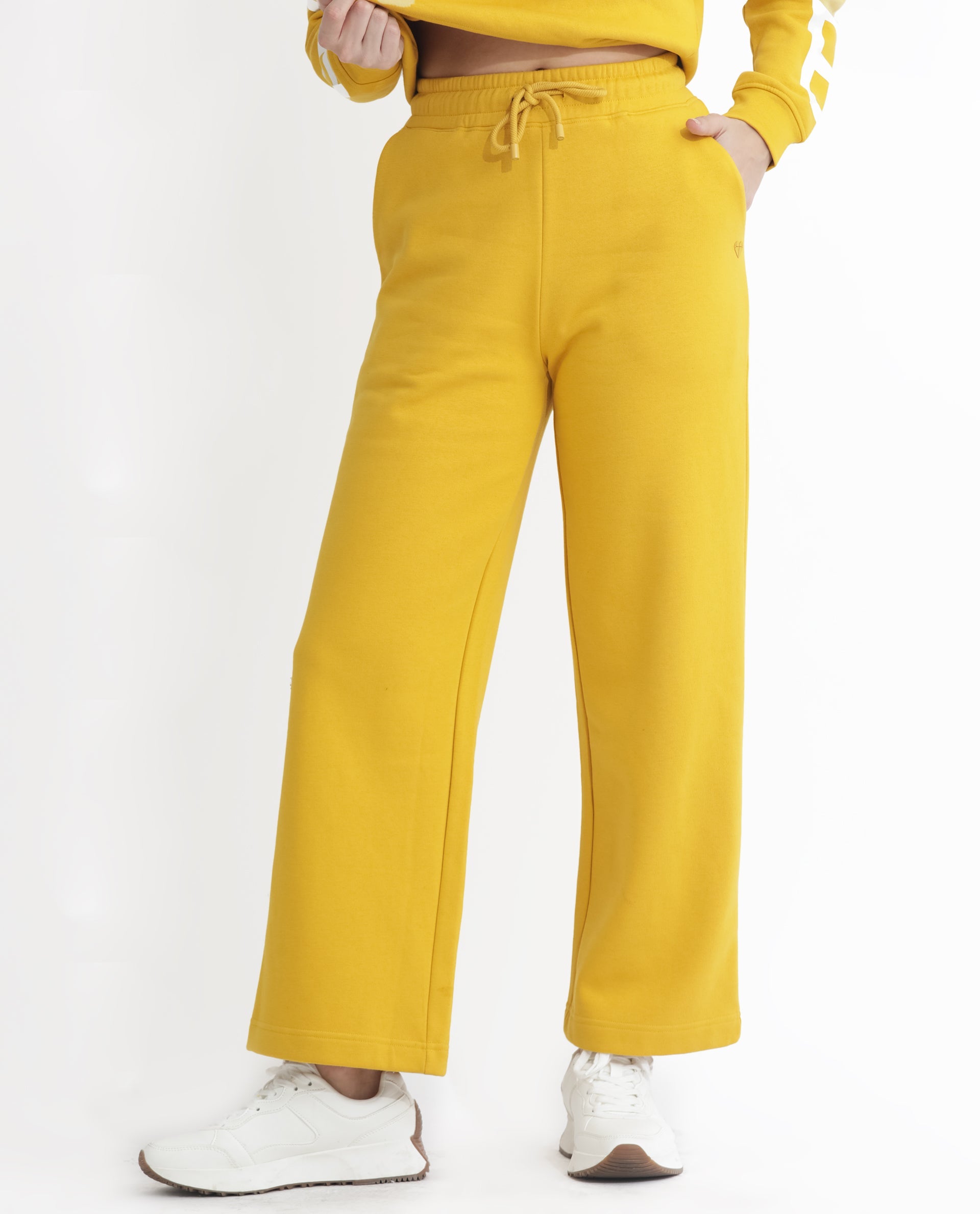 Rareism Women Pazoo F Mustard Cotton Blend Fabric Flared Solid Mid Rise Ankle Length Track Pant
