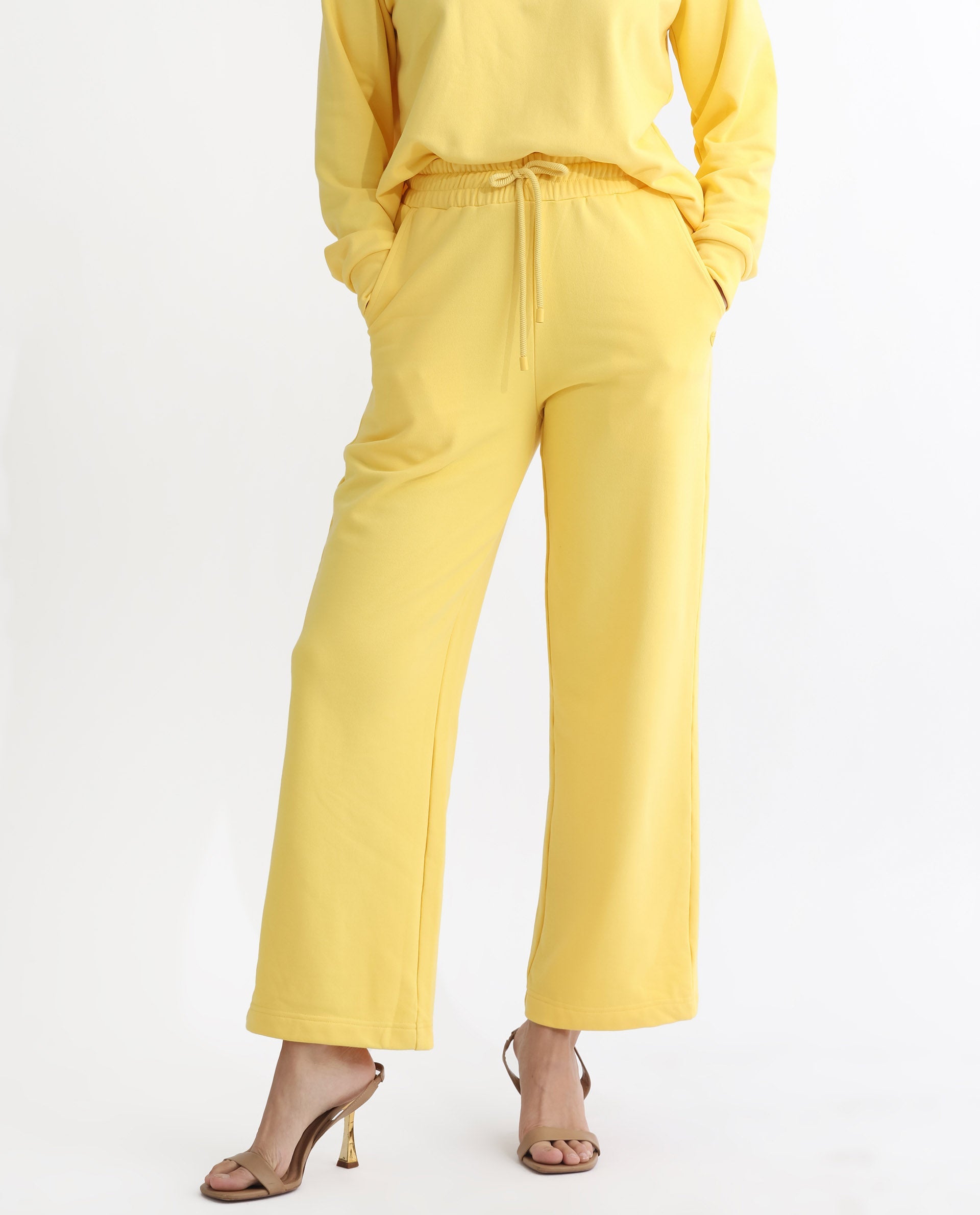 Rareism Articale Women Pazoo T Yellow Cotton Blend Fabric Drawstring Closure Flared Fit Plain Ankle Length Track Pant