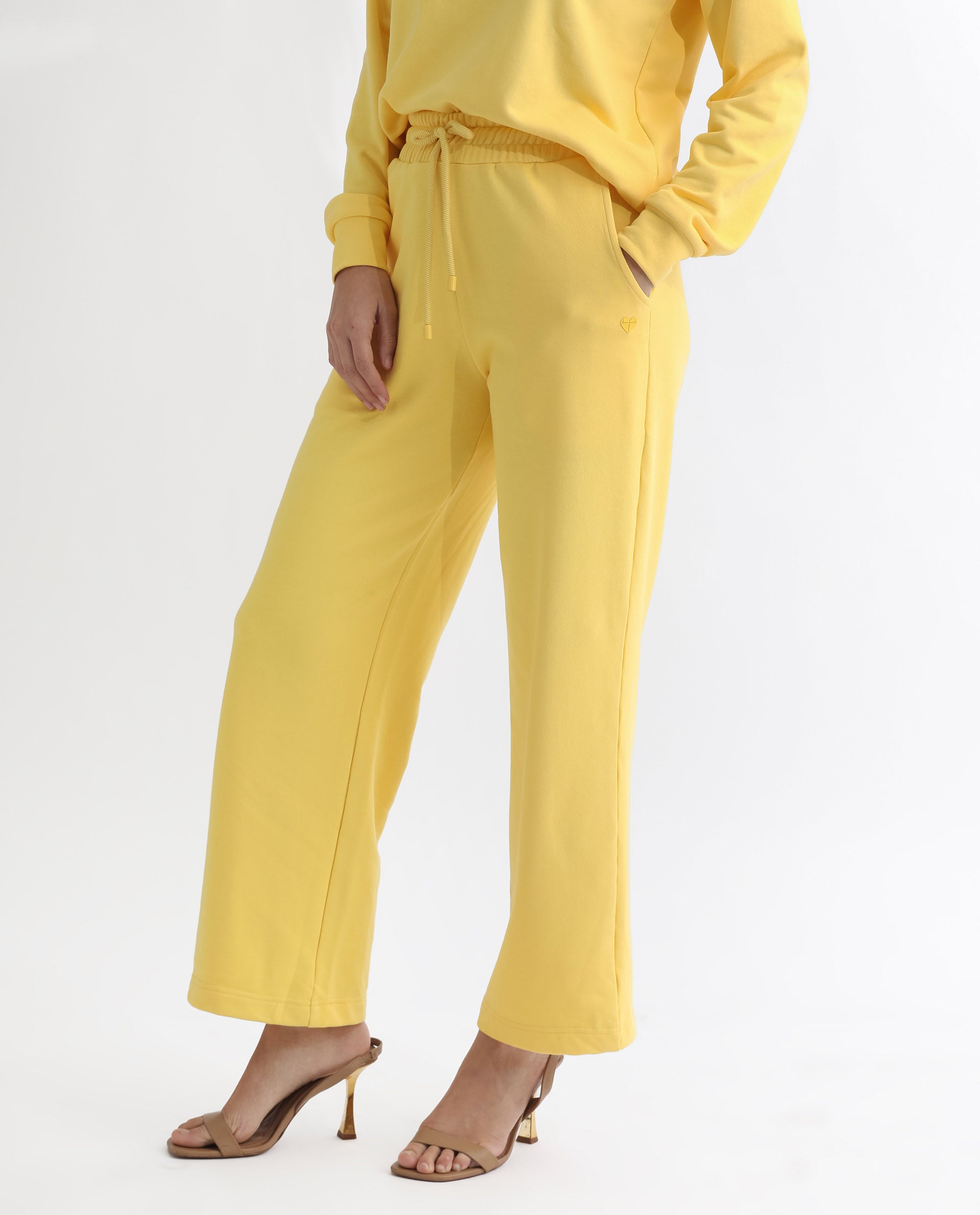 Rareism Articale Women Pazoo T Yellow Cotton Blend Fabric Drawstring Closure Flared Fit Plain Ankle Length Track Pant