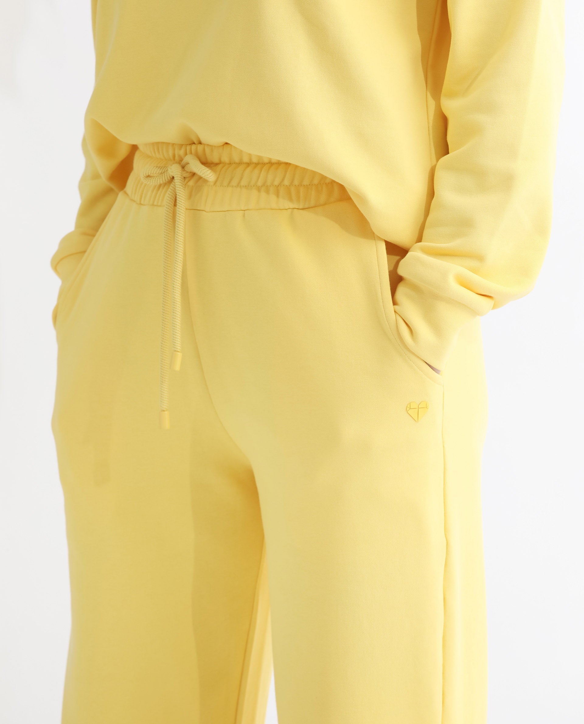 Rareism Articale Women Pazoo T Yellow Cotton Blend Fabric Drawstring Closure Flared Fit Plain Ankle Length Track Pant