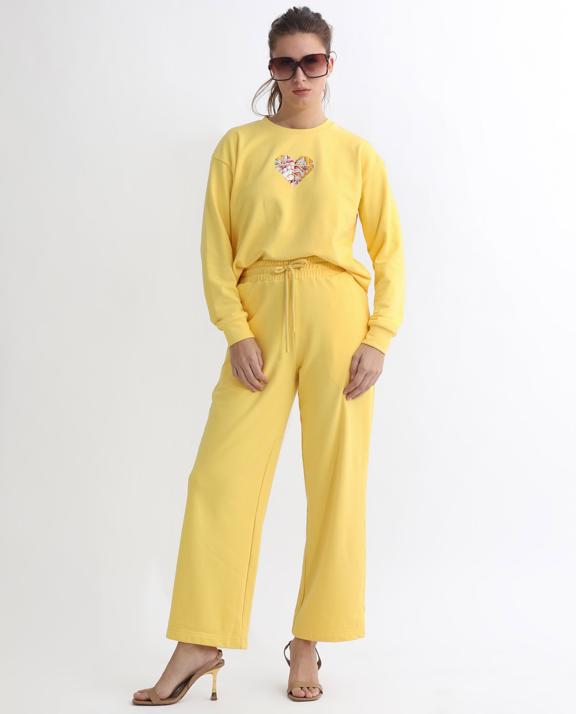 Rareism Articale Women Pazoo T Yellow Cotton Blend Fabric Drawstring Closure Flared Fit Plain Ankle Length Track Pant