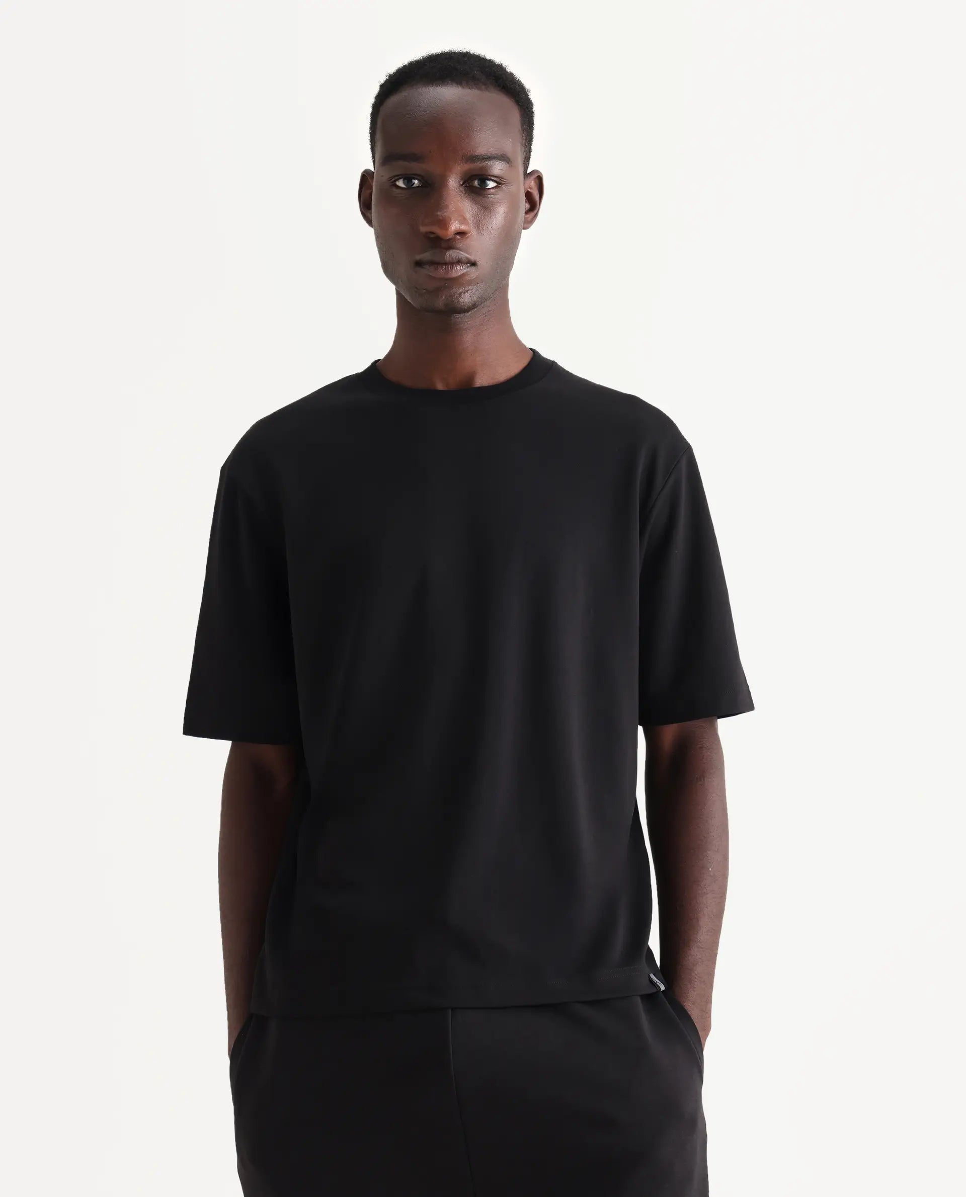 Rare Rabbit Men's Qlo Black Cotton Blend Plain Oversized Fit Half Sleeve Crew Neck T-Shirt