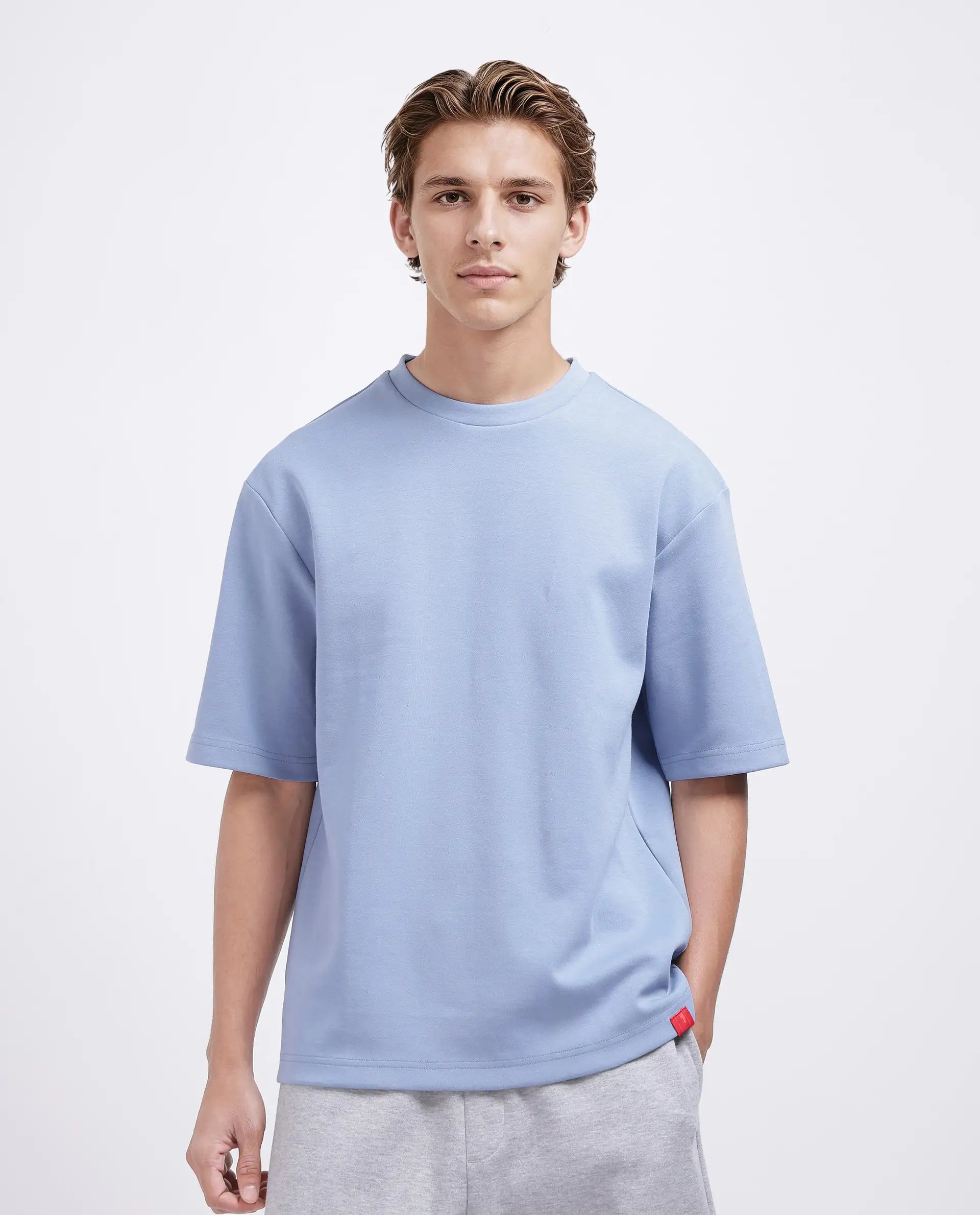 Rare Rabbit Men Qlos Dusky Blue Cotton Blend Fabric Short Sleeves Crew Neck Boxy Fit Plain T-Shirt