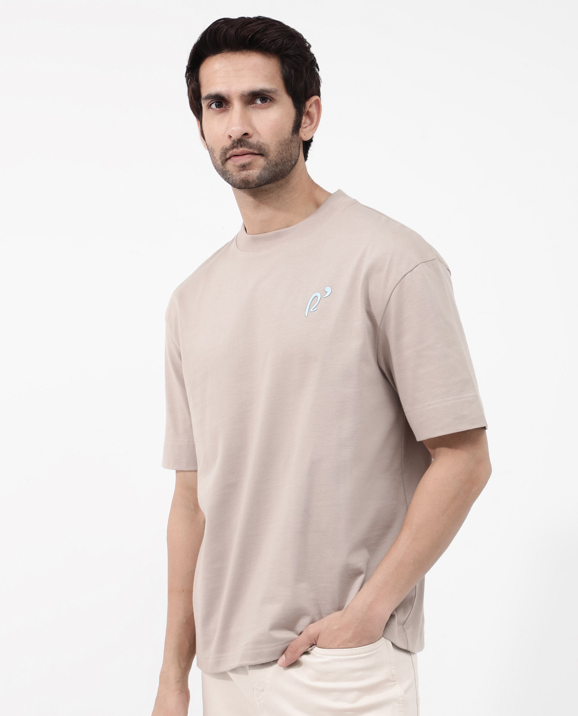 Rare Rabbit Articale Mens Quade Beige Cotton Polyester Fabric Short Sleeve Crew Neck Oversized Fit Graphic Printed T-Shirt