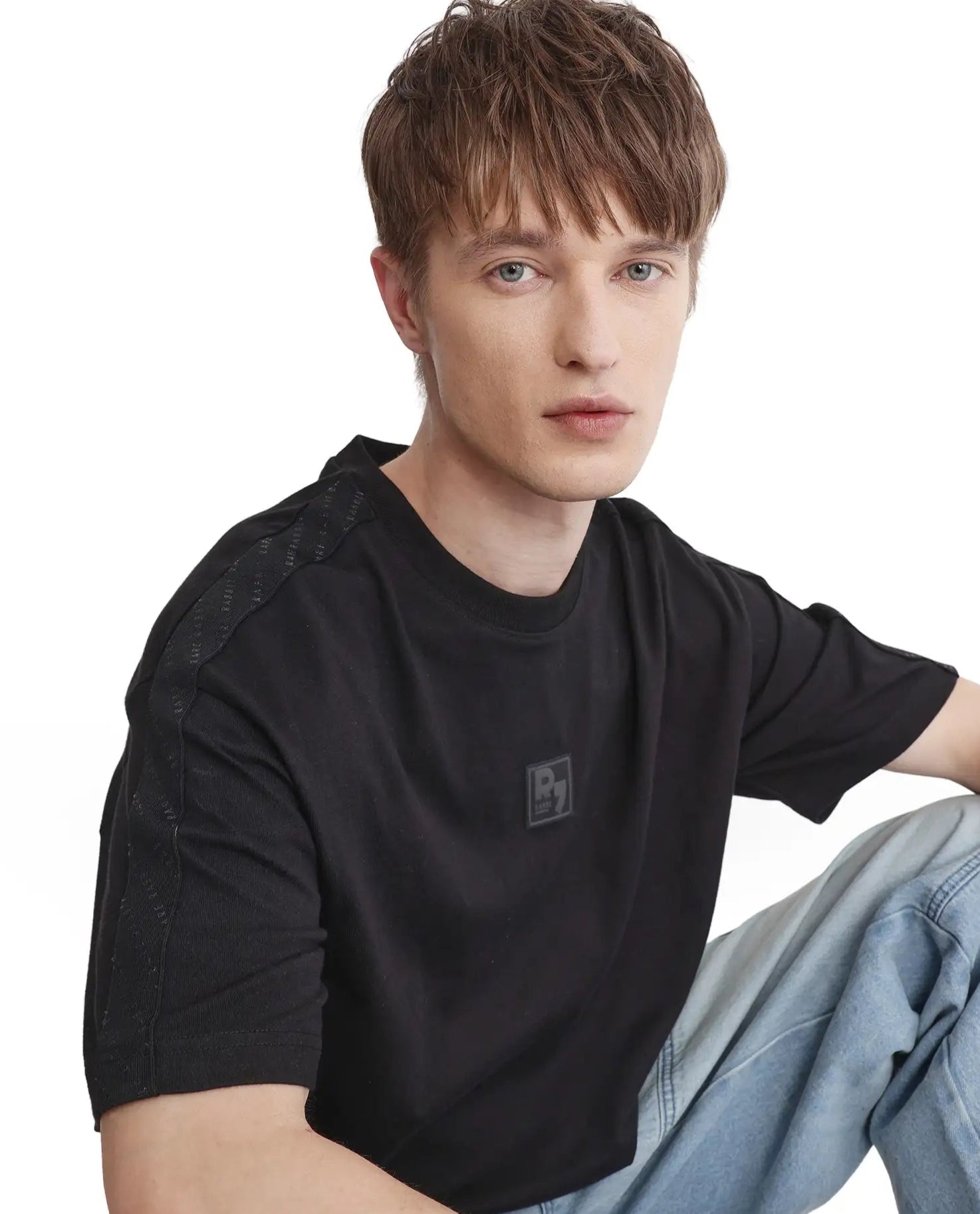 Rare Rabbit Men Quate Black Cotton Fabric Short Sleeve with Tape Details  Badge Branding Boxy Fit Badge Branding T-Shirt