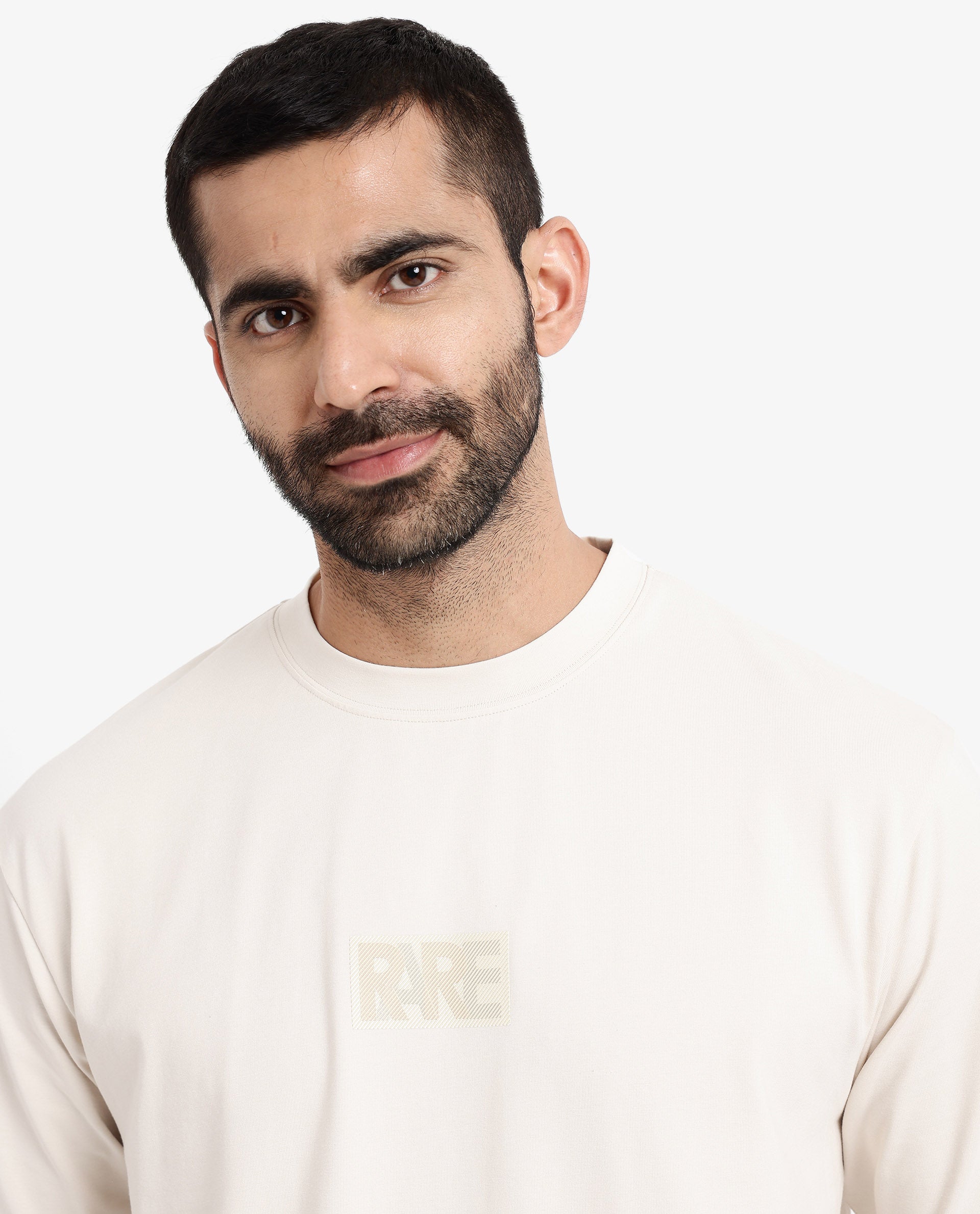 Rare Rabbit Men Reborn-T Beige Cotton Fabric Short Sleeve Crew Neck Oversized Fit Graphic Print T-Shirt