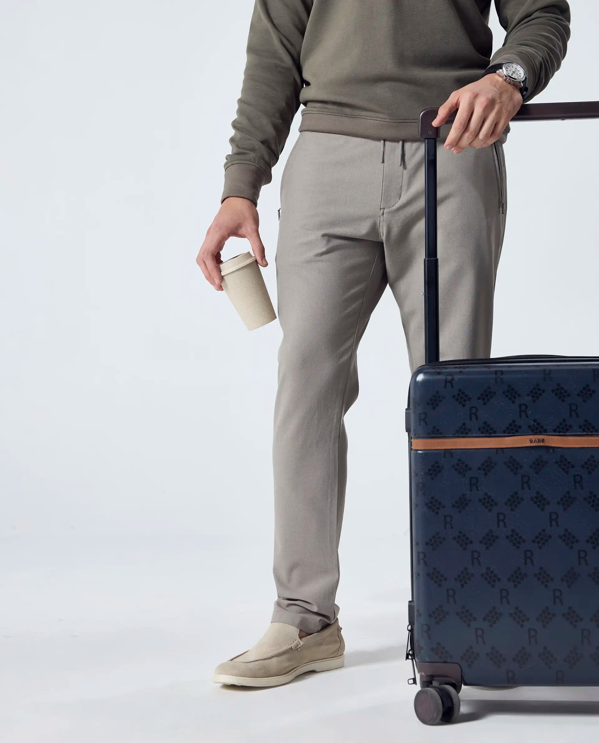 Rare Rabbit Men's Move-25 Beige Polyester Blend Plain Regular Fit Trouser
