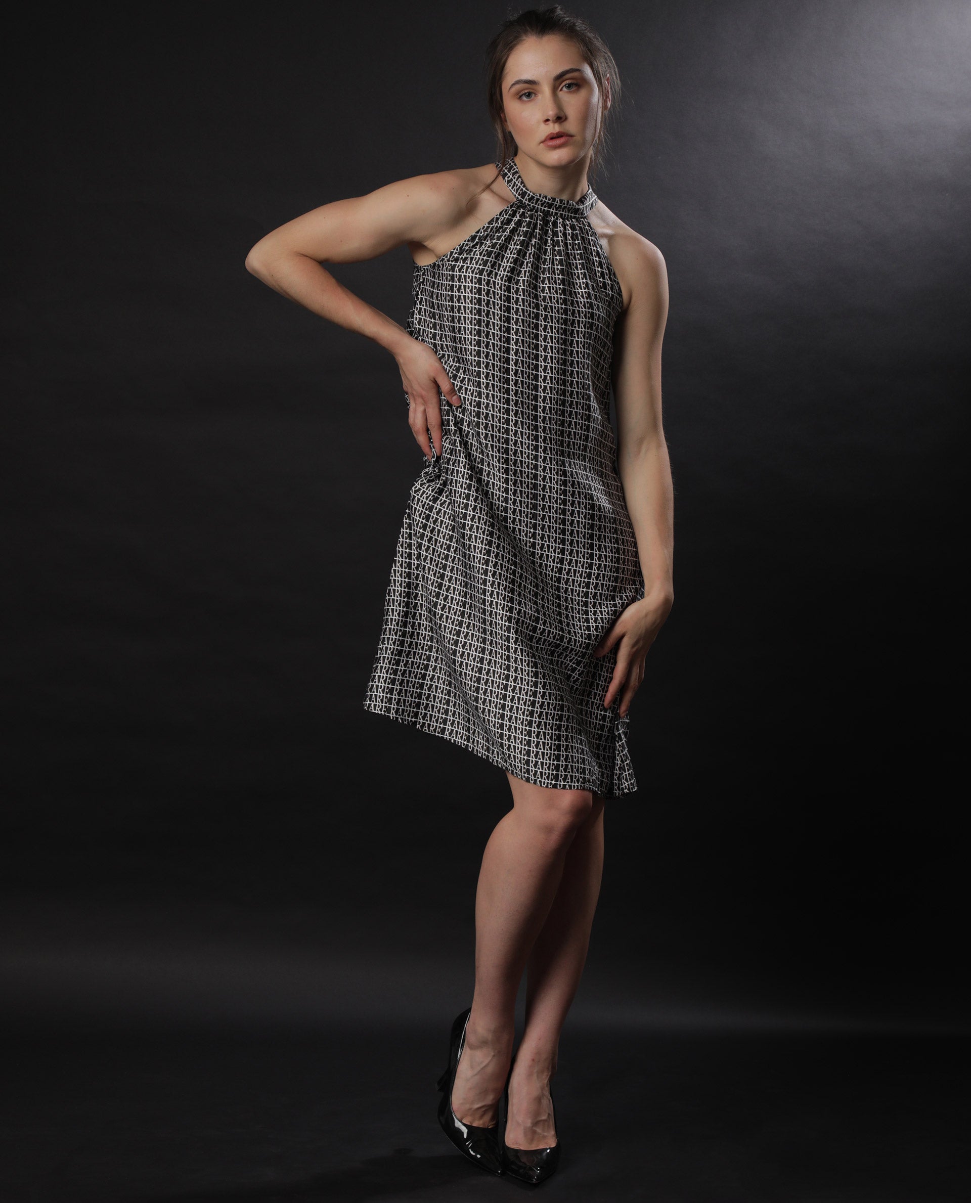 Rareism Women Renata Black Halter Neck With Tie Up Back And Pockets Knee Length Dress