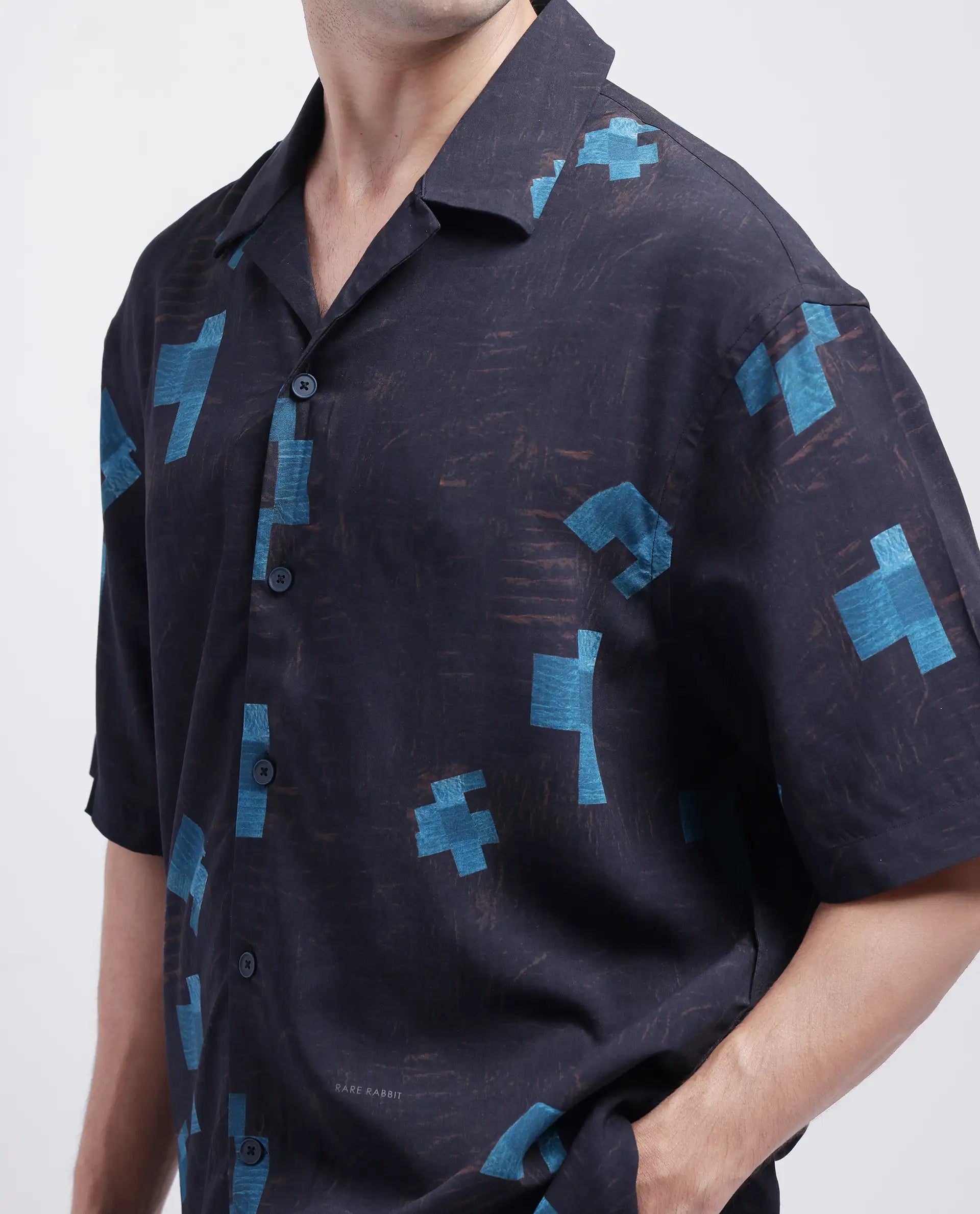 Rare Rabbit Men Riko Dark Brown Viscose Fabric Half Sleeve Cuban Collar Button Closure Oversized Fit Abstract Print Shirt