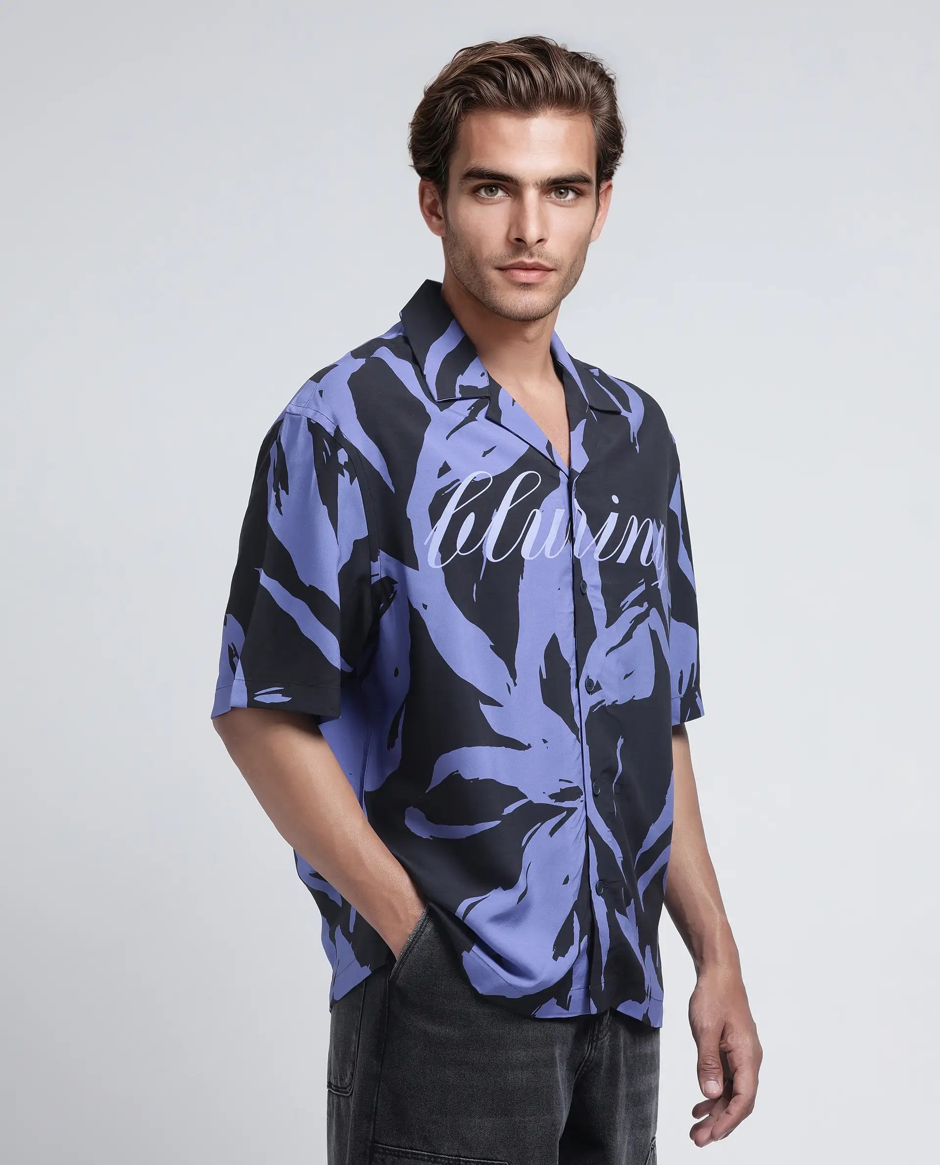 Rare Rabbit Men Rinz Black Viscose Fabric Half Sleeve Cuban Collar Button Closure Oversized Fit Placement Print Shirt