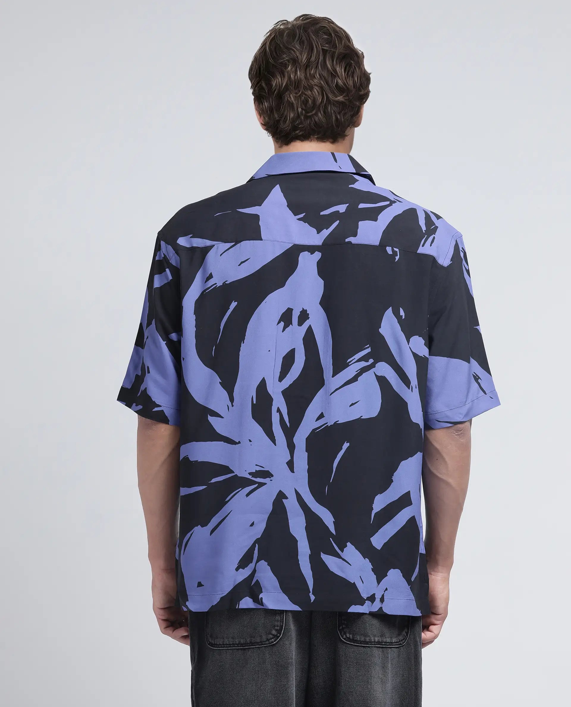 Rare Rabbit Men Rinz Black Viscose Fabric Half Sleeve Cuban Collar Button Closure Oversized Fit Placement Print Shirt