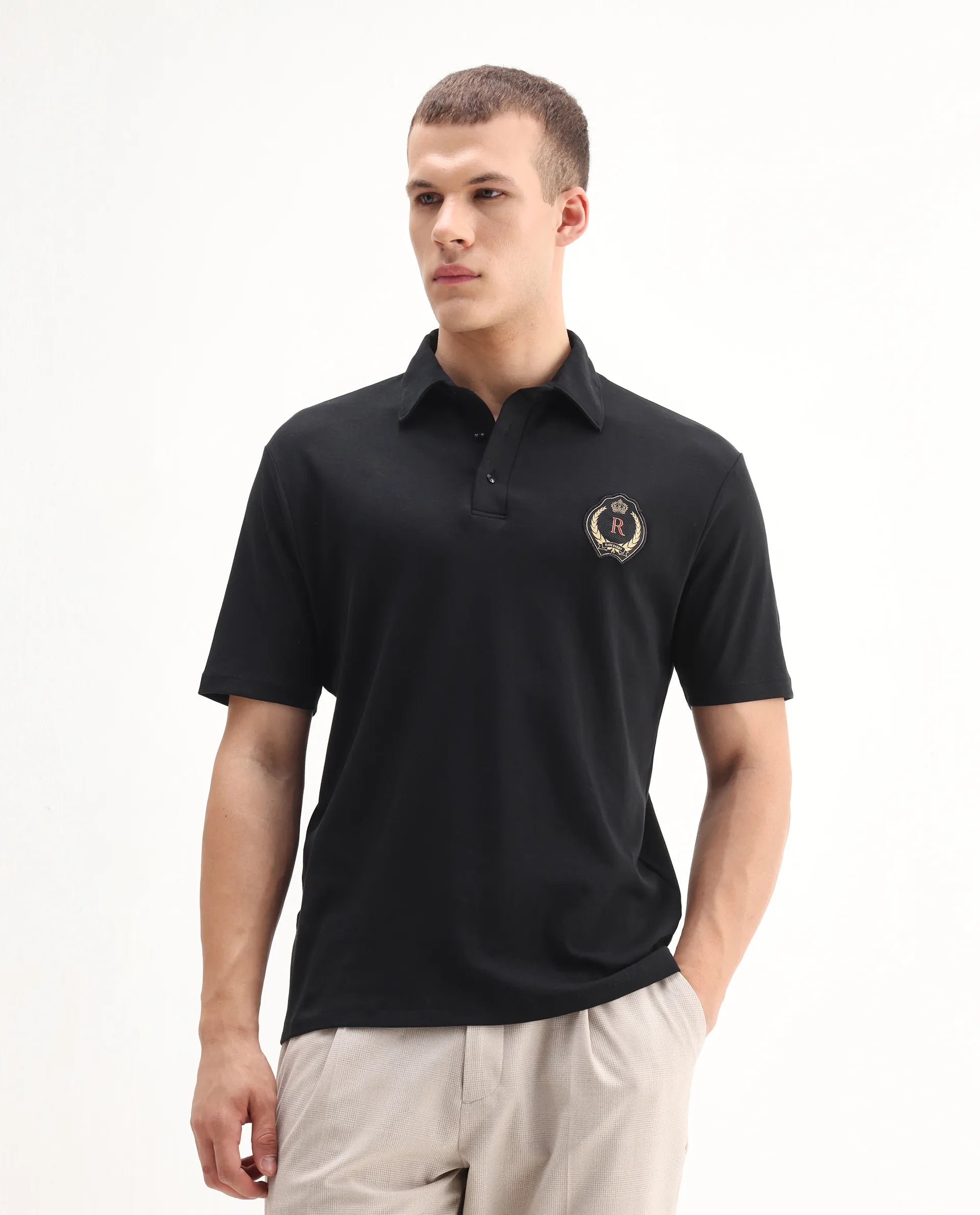 Rare Rabbit Men's Ritz Black` Cotton Plain Regular Fit Half Sleeve Polo