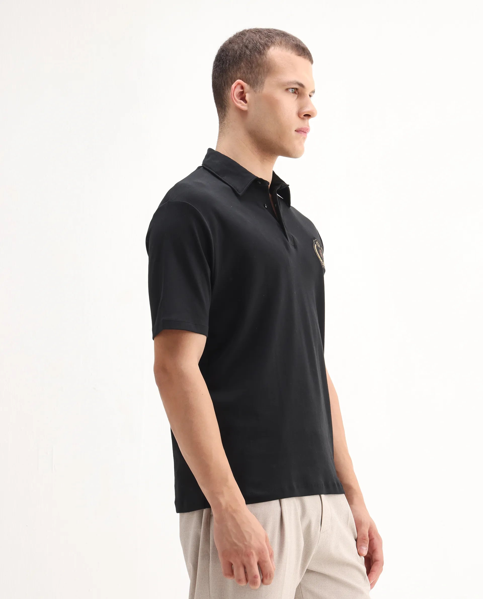 Rare Rabbit Men's Ritz Black` Cotton Plain Regular Fit Half Sleeve Polo
