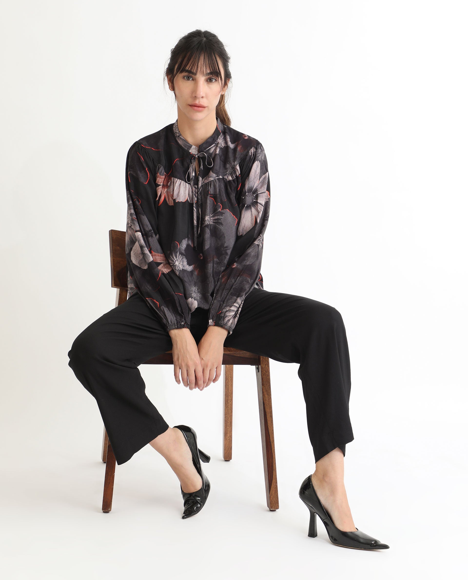 Rareism Women Rothal Black Poly Viscose Fabric Full Sleeves Tie-Up Closure Tie-Up Neck Balloon Sleeve Relaxed Fit Floral Print Blouse Top