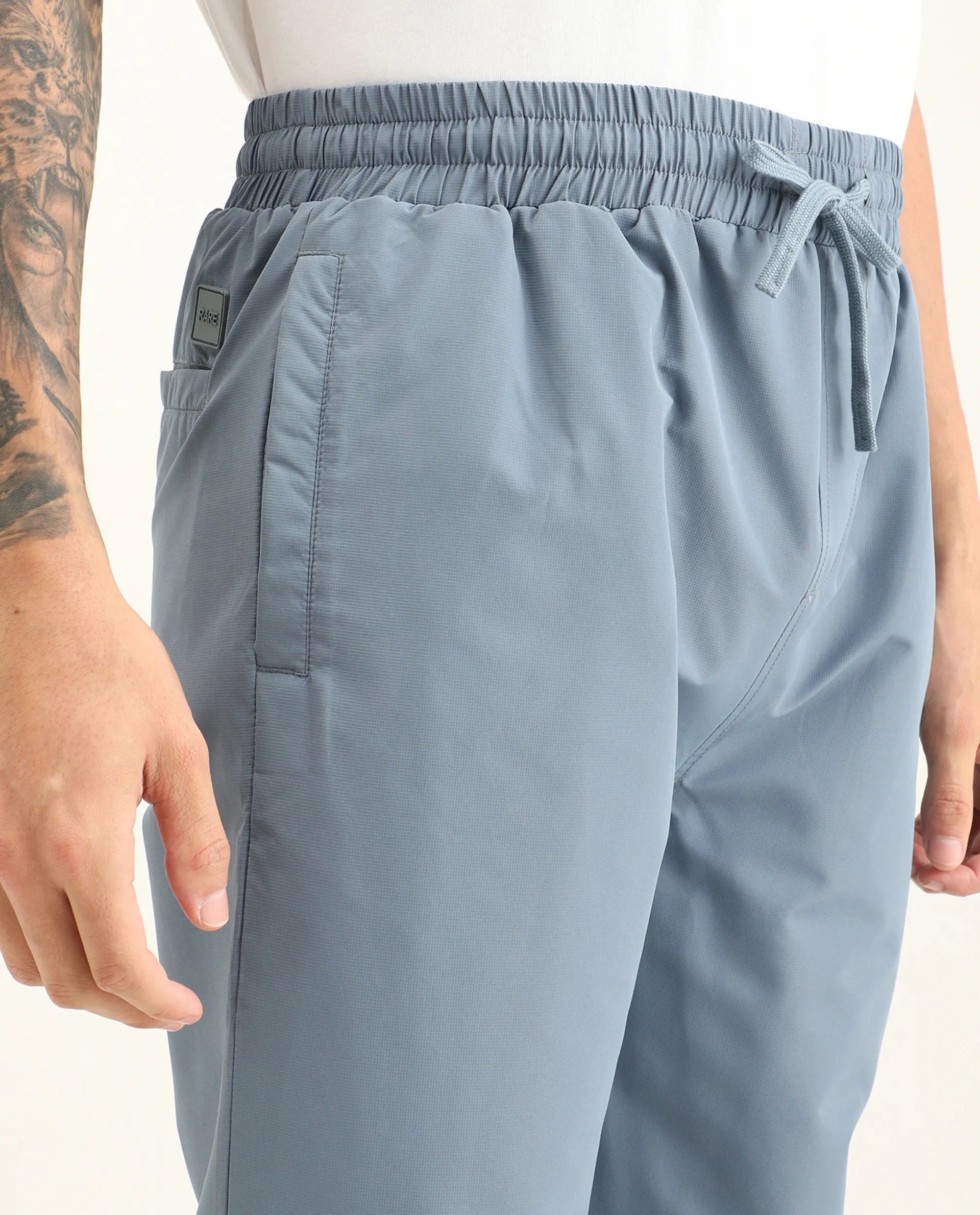Rare Rabbit Men's Waber-B Light Blue Polyester Cut And Sew Regular Fit Track Pant