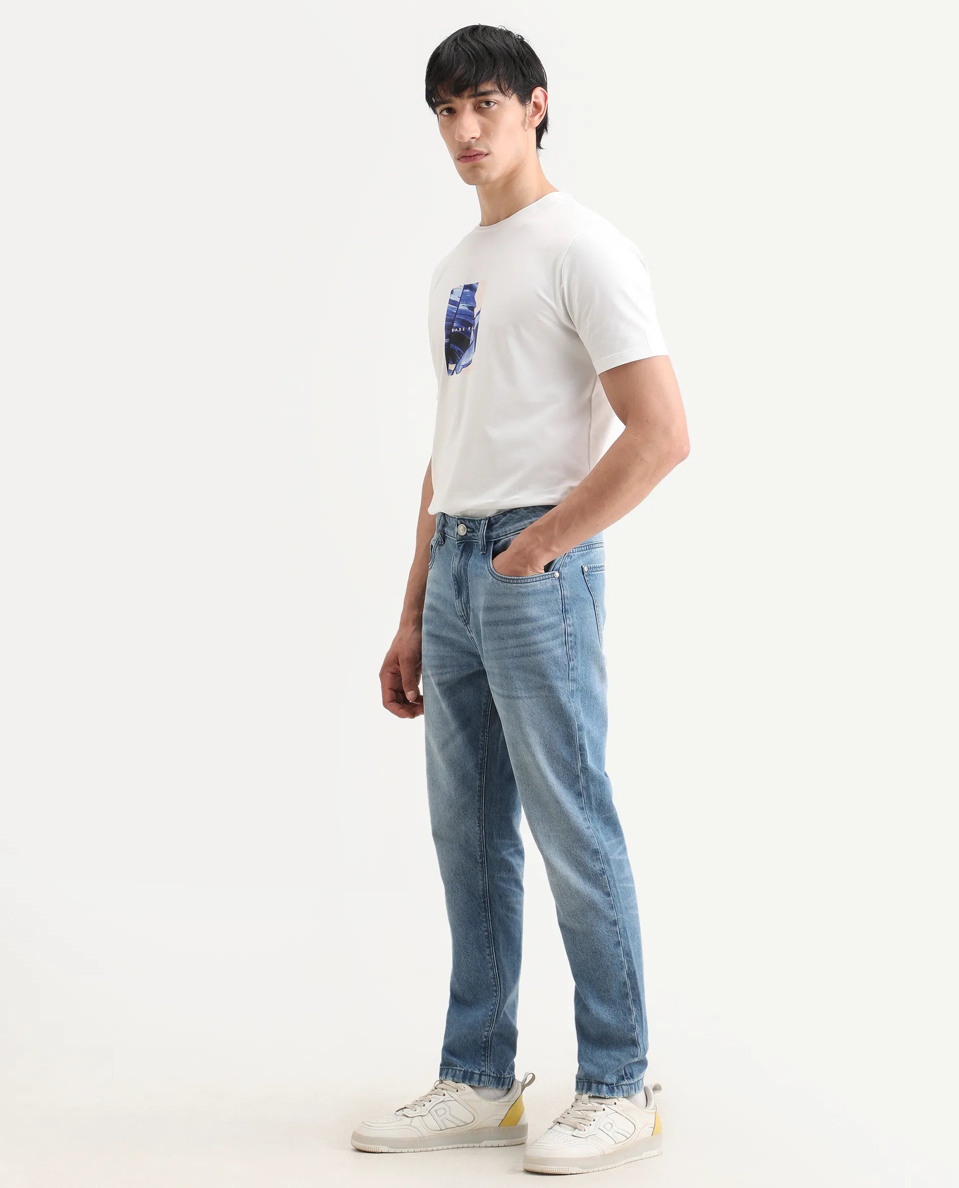 Rare Rabbit Men's Fynn Light Blue Cotton Fabric Kurt Carrot Plain Jeans