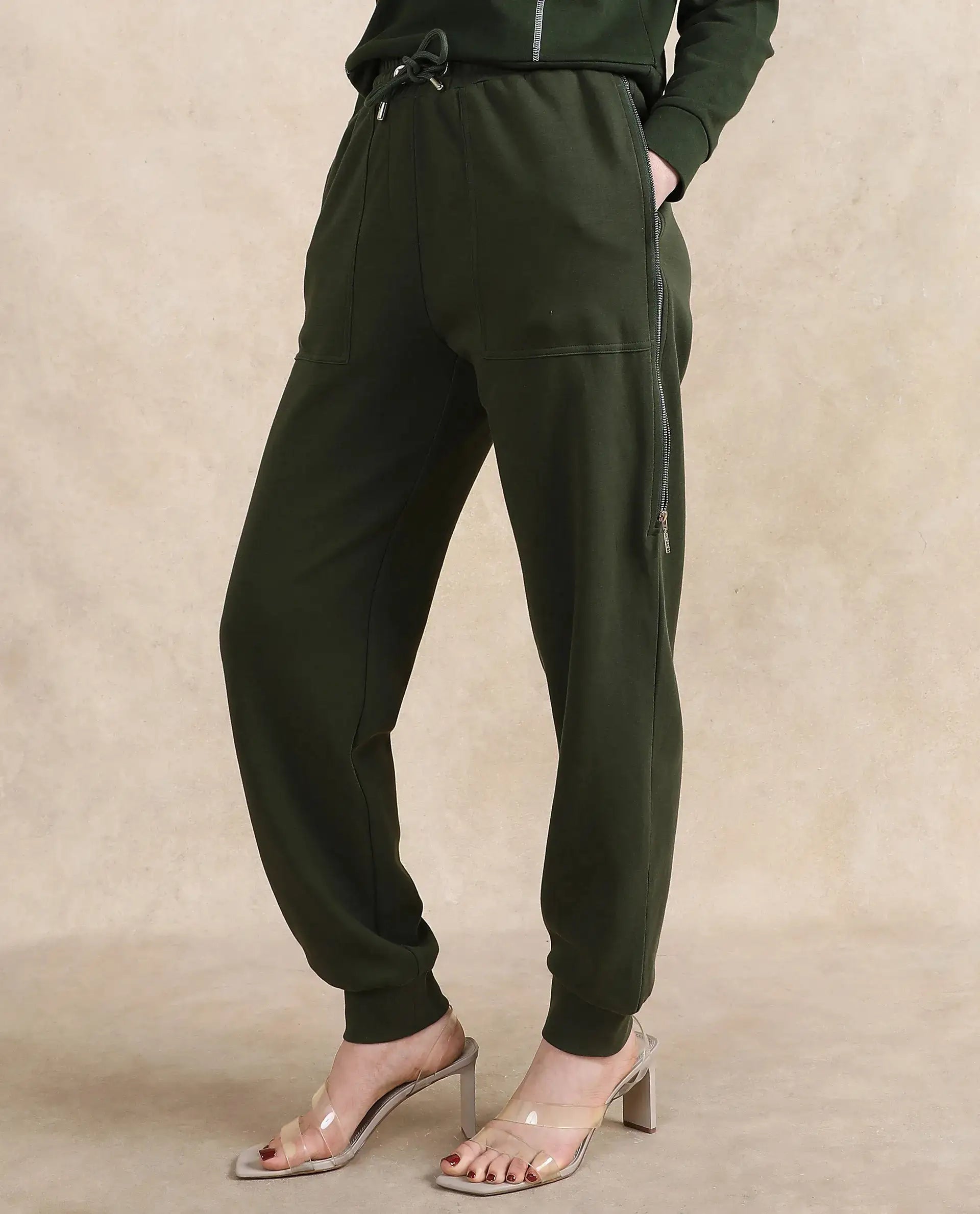 Rareism Women Saints Olive Cotton Blend Fabric Ankle Length Plain Track Pant