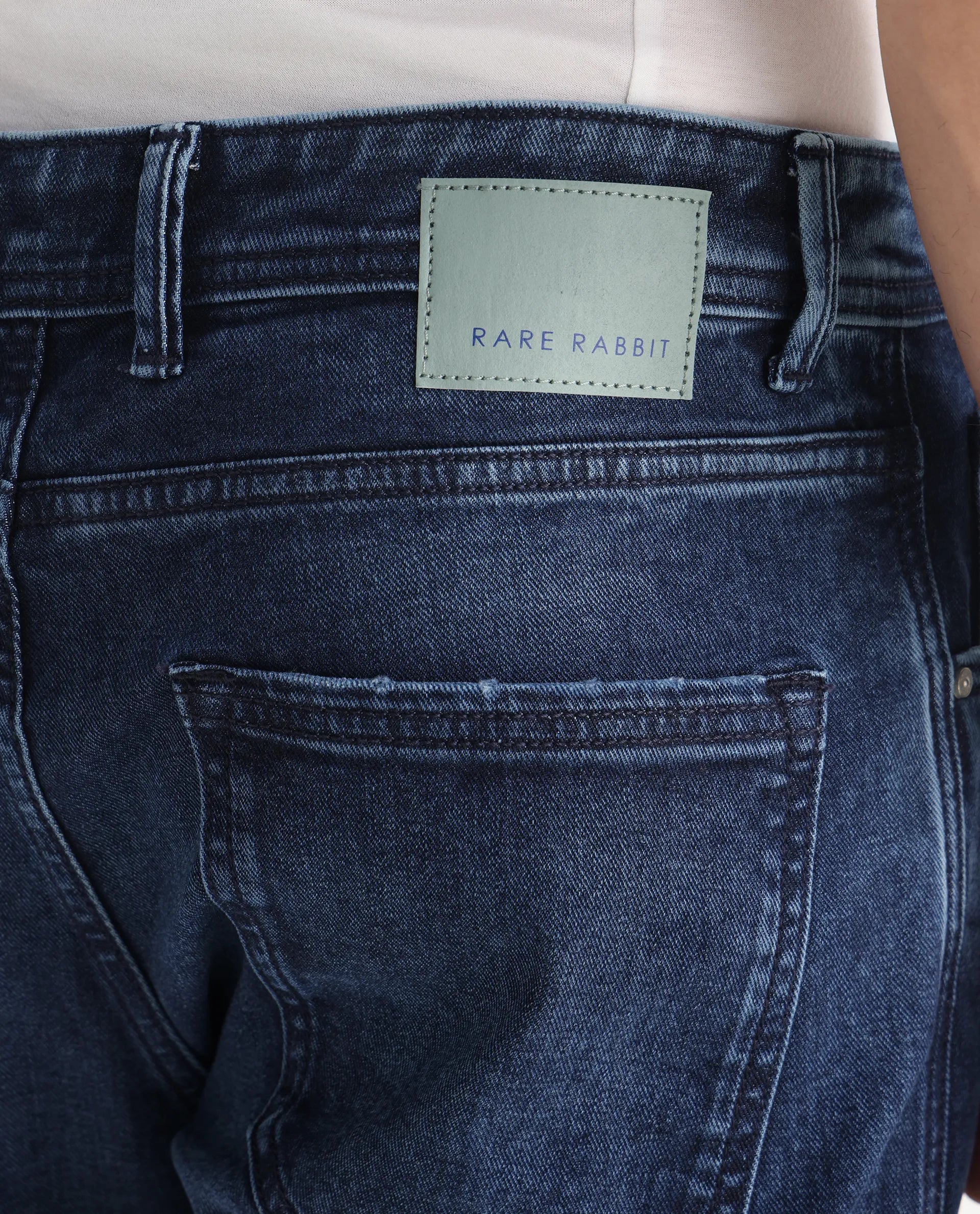 Rare Rabbit Men's Sam-2 Dusky Blue Cotton Plain Kurt Carrot Fit Jeans