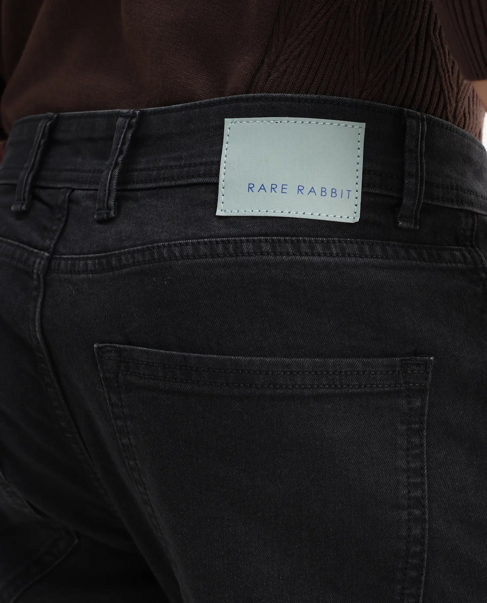 Rare Rabbit Men's Sam-2 Black Cotton Plain Kurt Carrot Fit Jeans