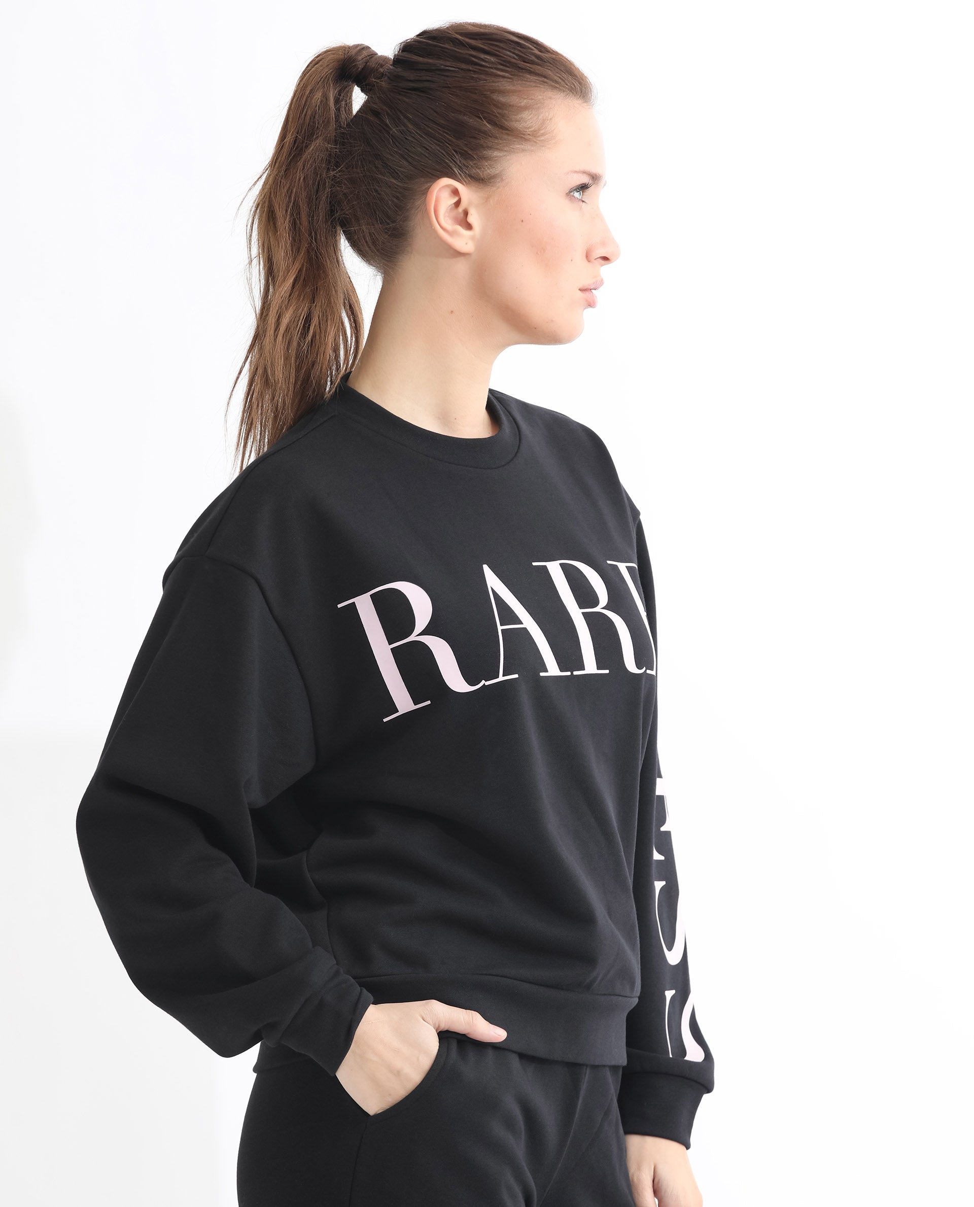 Rareism Women Shelly Black Poly Cotton Fabric Relaxed Fit Full Sleeves Solid Round Neck Sweatshirt