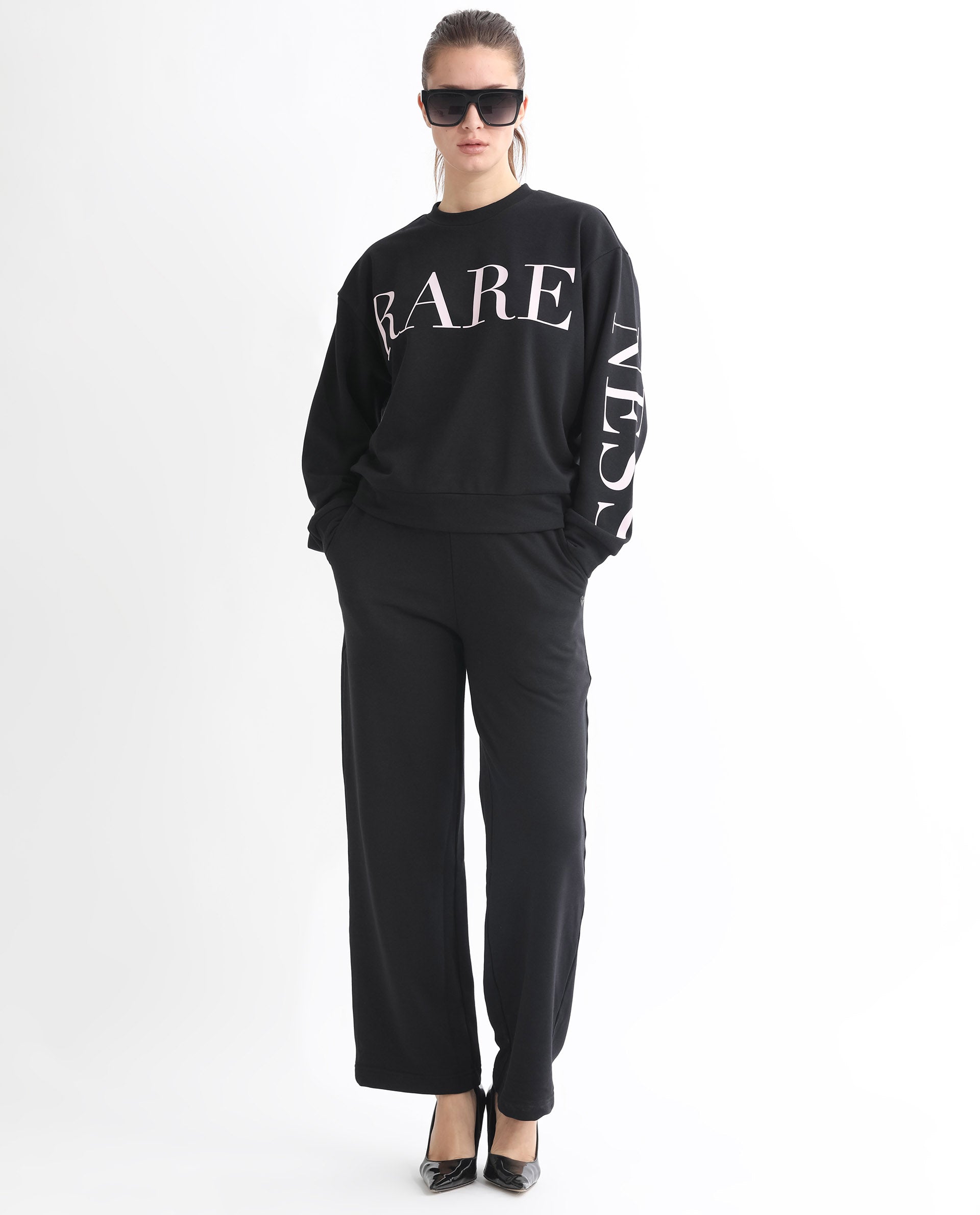 Rareism Women Shelly Black Poly Cotton Fabric Relaxed Fit Full Sleeves Solid Round Neck Sweatshirt