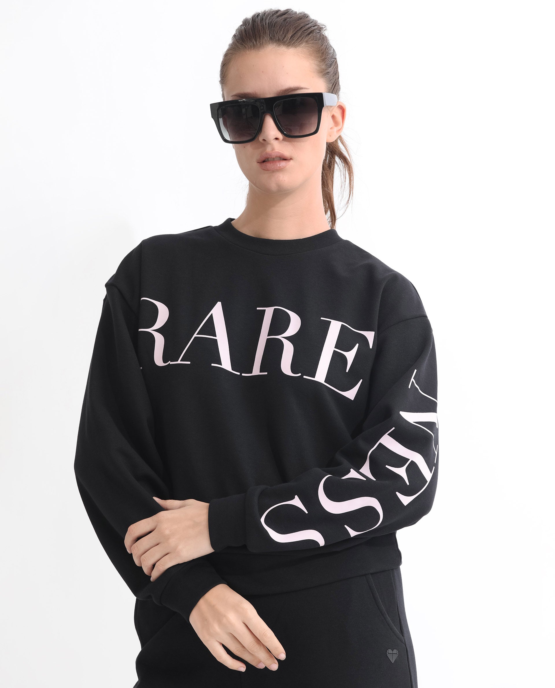 Rareism Women Shelly Black Poly Cotton Fabric Relaxed Fit Full Sleeves Solid Round Neck Sweatshirt