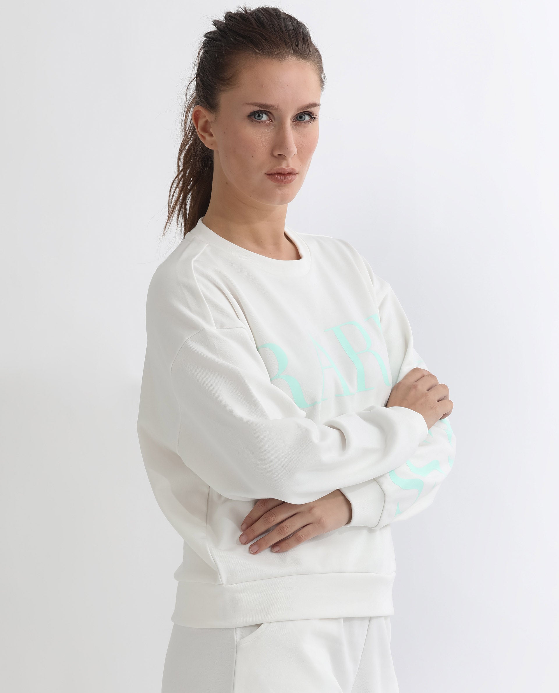 Rareism Articale Women Shelly Off White Poly Cotton Fabric Full Sleeves Cuffed Sleeve Round Neck Relaxed Fit Graphic Print Sweatshirt