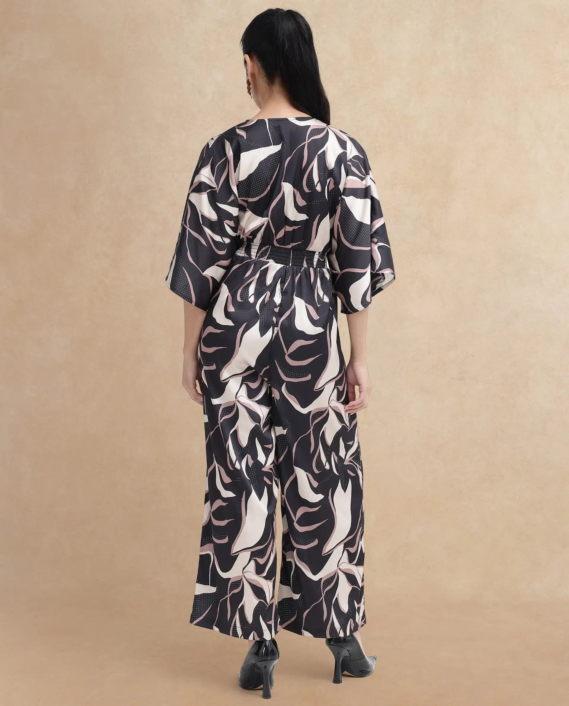 Rareism Women Sonrka Multi Zipper Closure Extended Sleeves Over Lap Neck Relaxed Fit Abstract Print Maxi Jump Suit