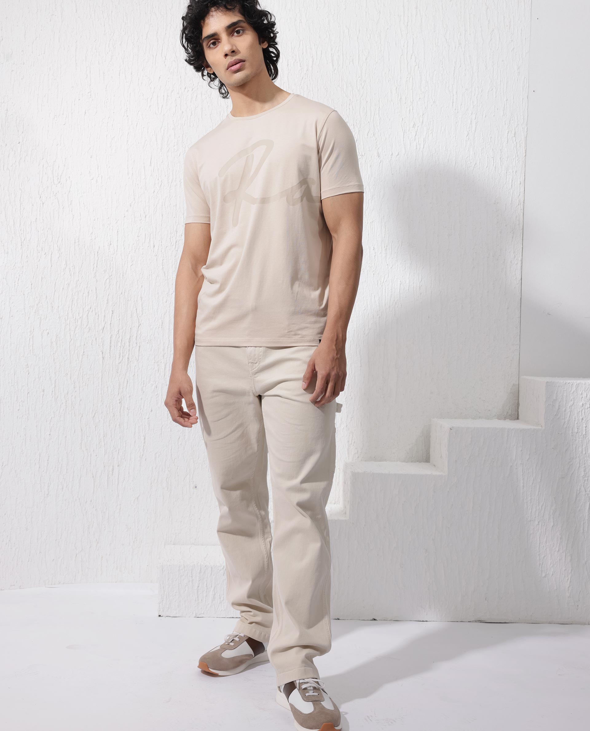 Rare Rabbit Men's Stamp-2 Beige Cotton Lycra Fabric Half Sleeves Graphic Signature Print T-Shirt