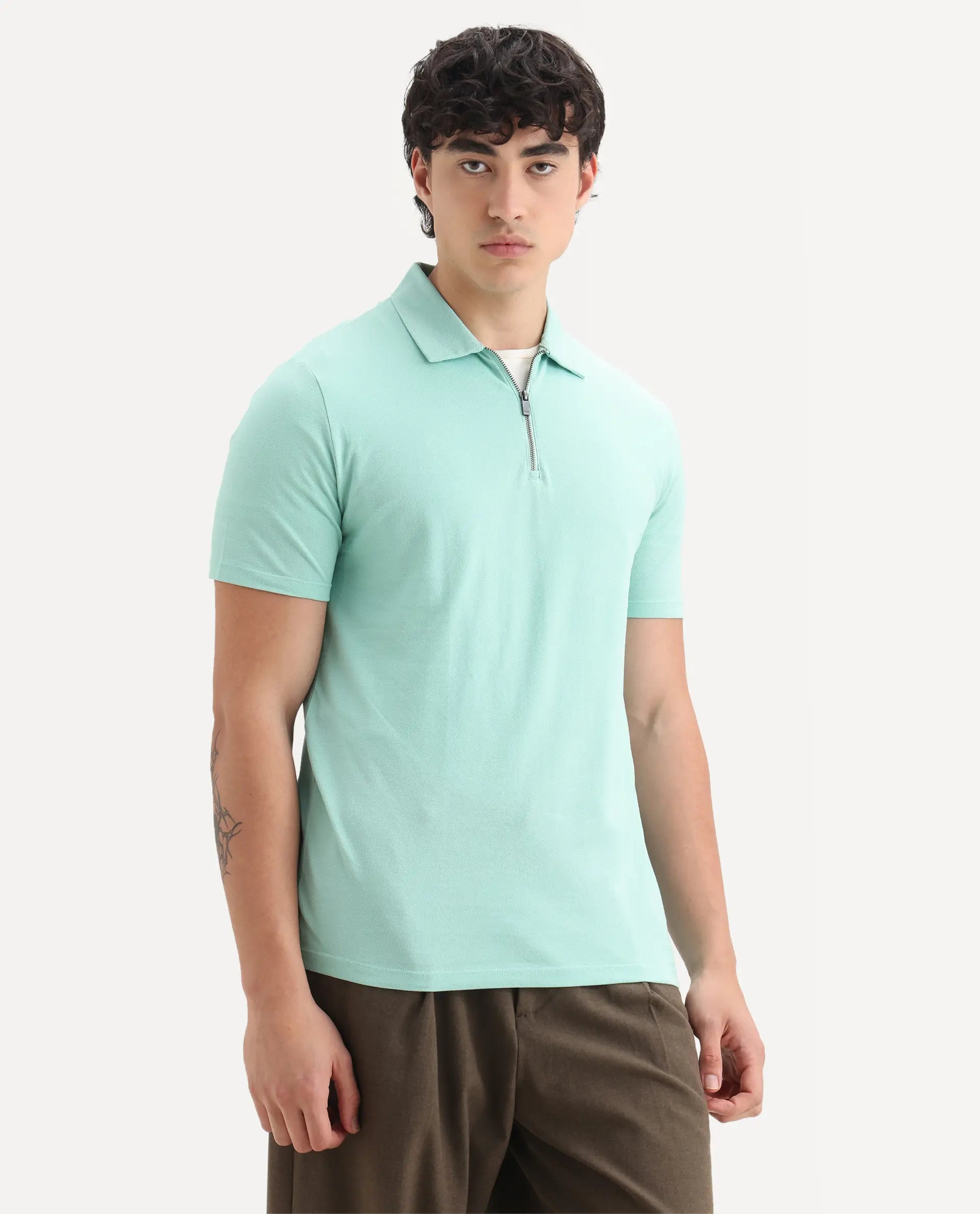 Rare Rabbit Men's Stel Pastel Green Cotton Plain Regular Fit Half Sleeve Polo
