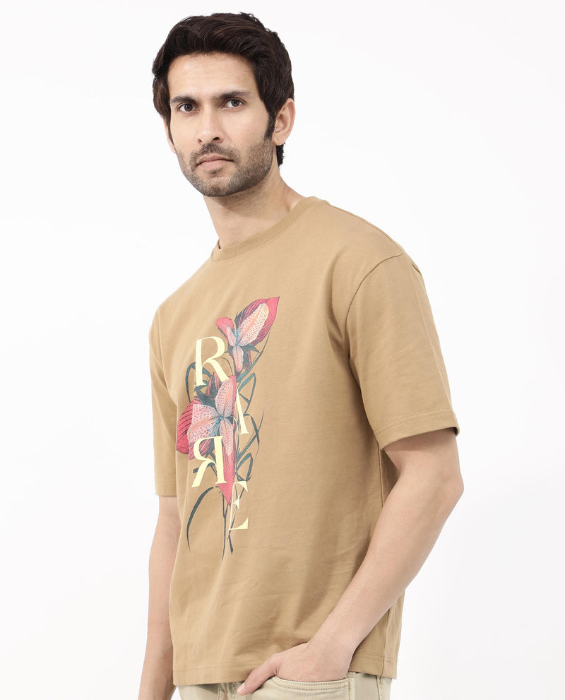 Rare Rabbit Articale Mens Tate Brown Cotton Fabric Short Sleeve Crew Neck Oversized Fit Printed T-Shirt