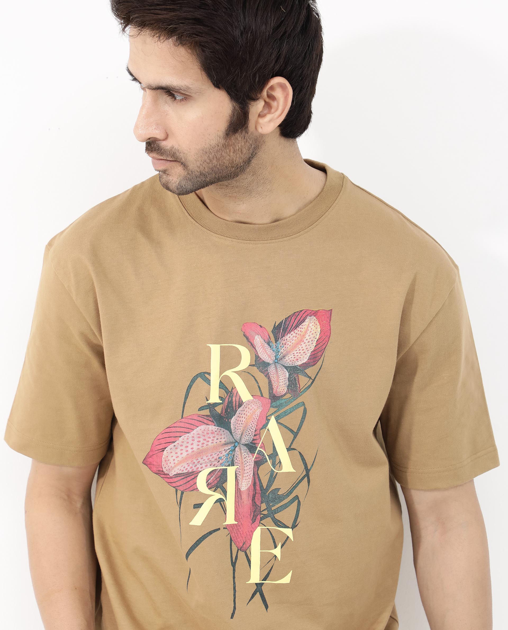 Rare Rabbit Articale Mens Tate Brown Cotton Fabric Short Sleeve Crew Neck Oversized Fit Printed T-Shirt