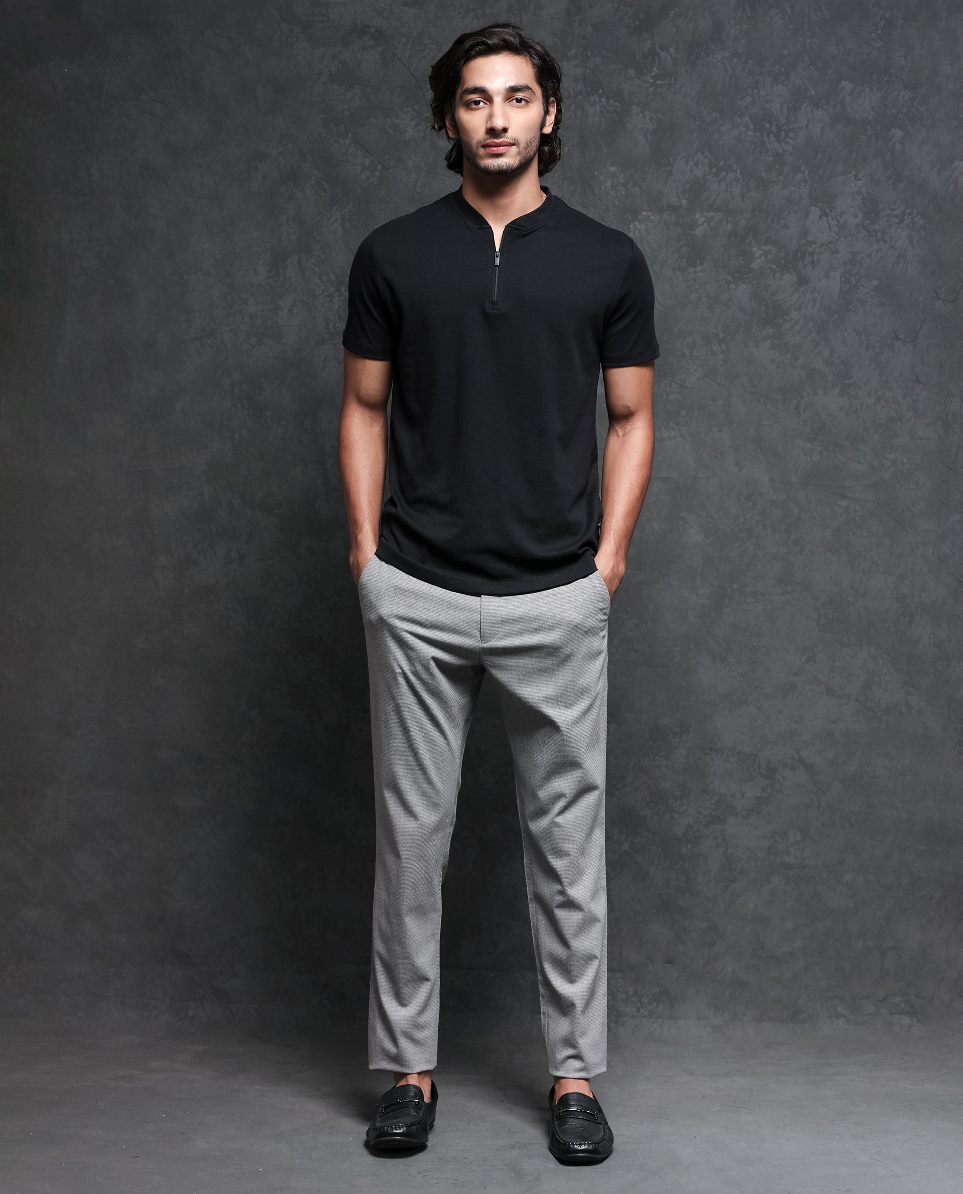 Black polo with grey 2025 pants