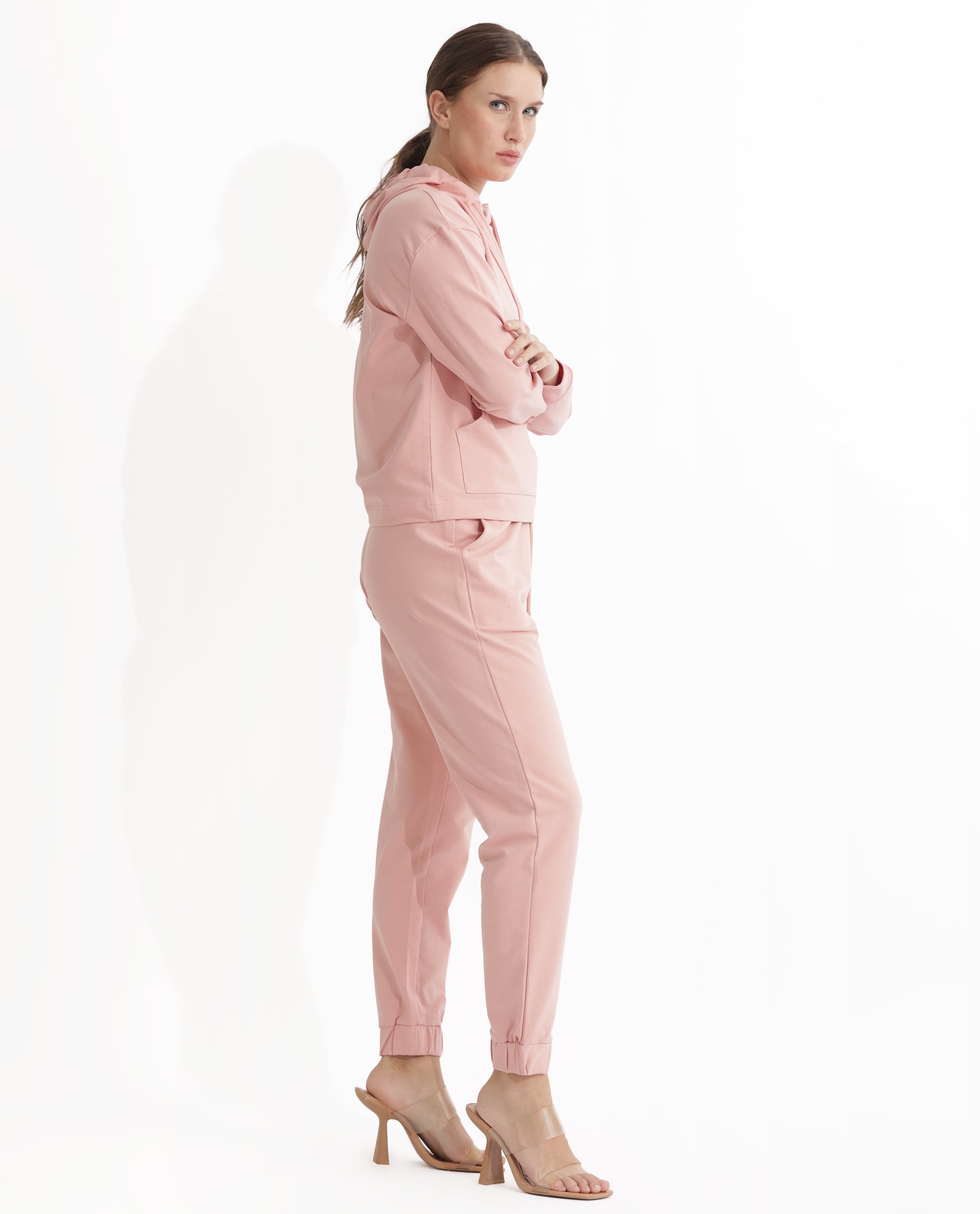 Rareism Women Terac Light Orange Cotton Lycra Fabric Regular Fit Solid Mid Rise Ankle Length Track Pant