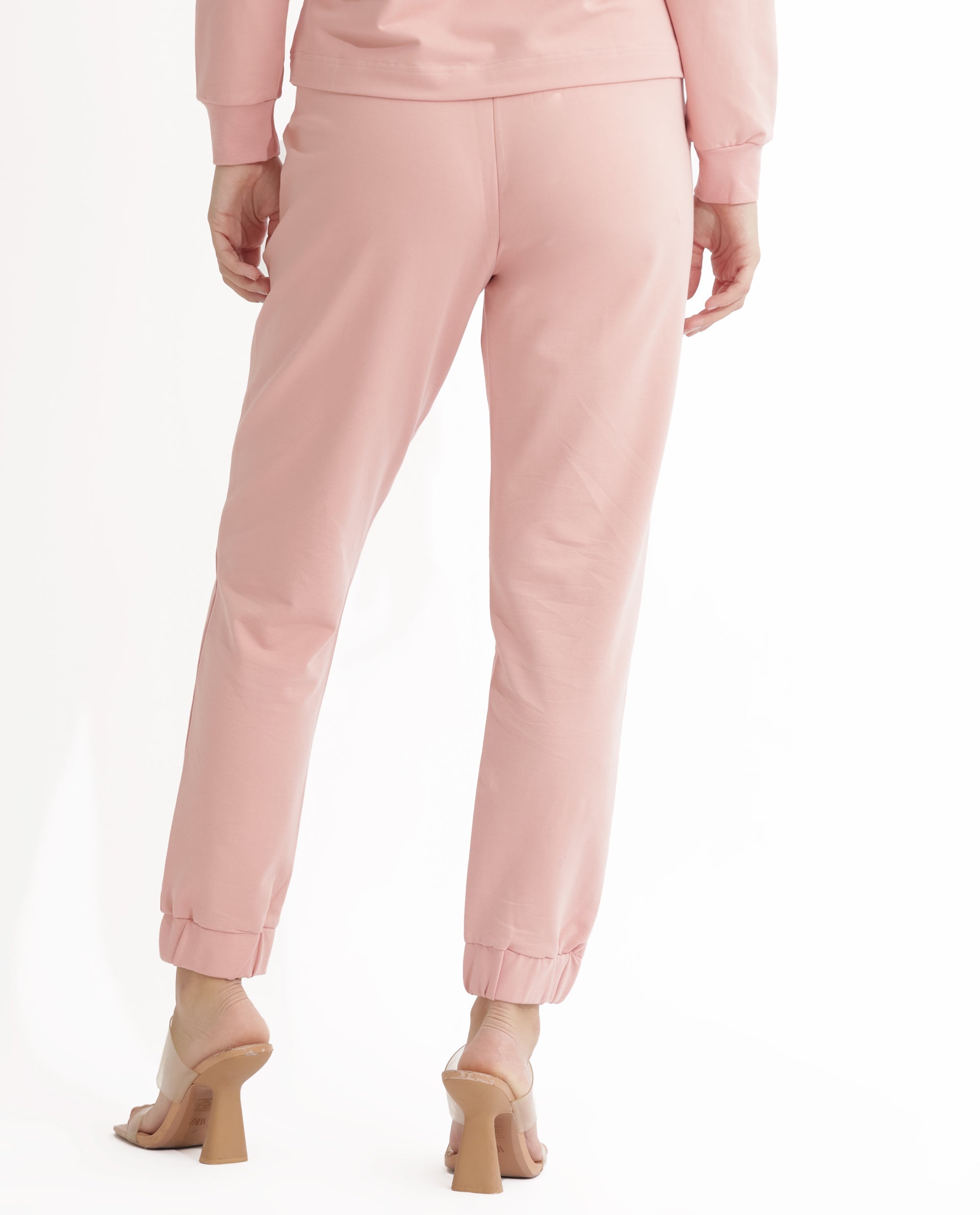 Rareism Women Terac Light Orange Cotton Lycra Fabric Regular Fit Solid Mid Rise Ankle Length Track Pant