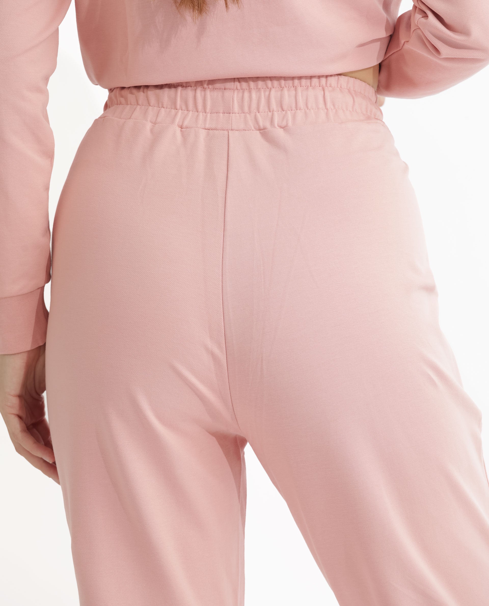 Rareism Women Terac Light Orange Cotton Lycra Fabric Regular Fit Solid Mid Rise Ankle Length Track Pant