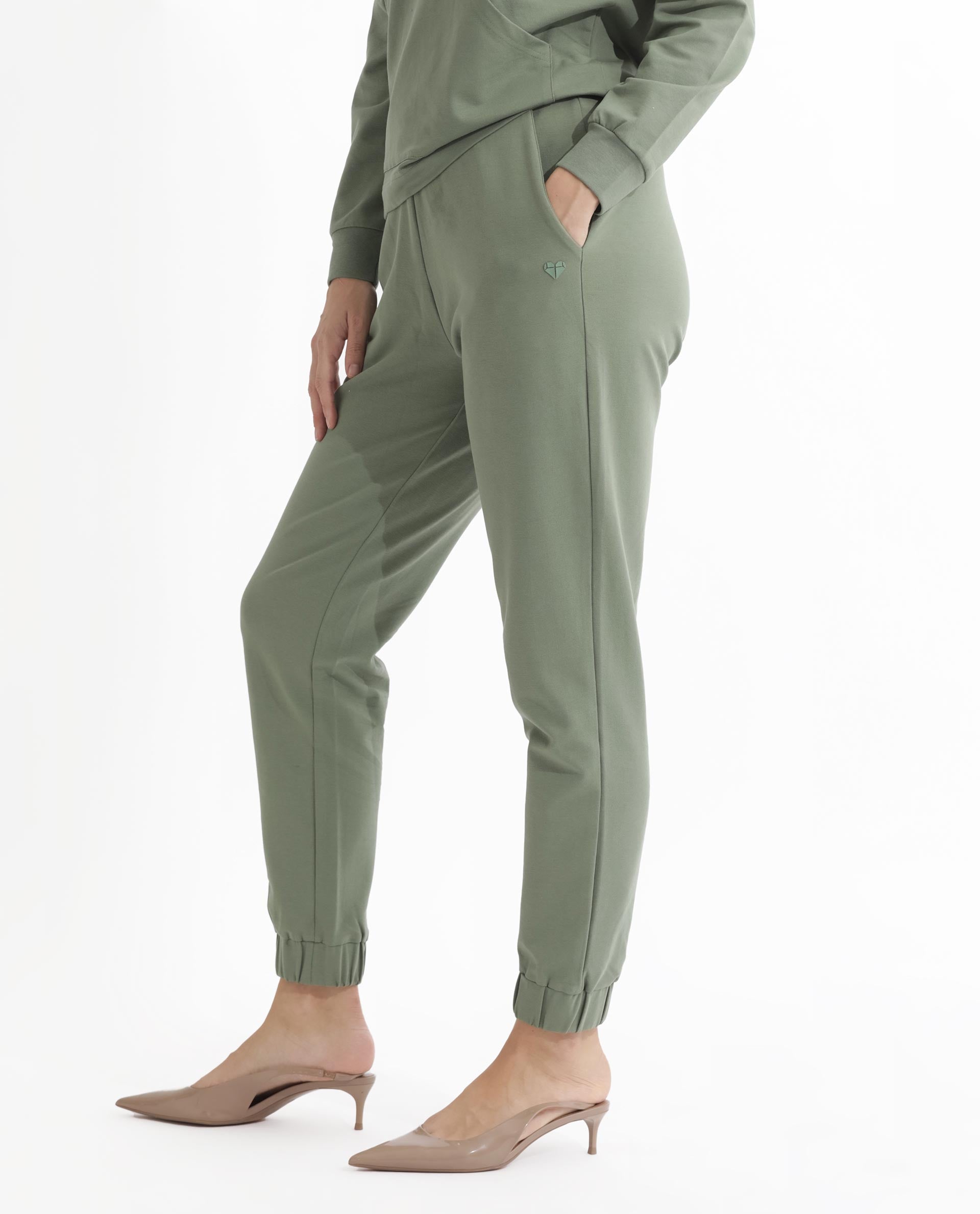 Rareism Women Terac Dusky Green Cotton Lycra Fabric Regular Fit Solid Mid Rise Ankle Length Track Pant