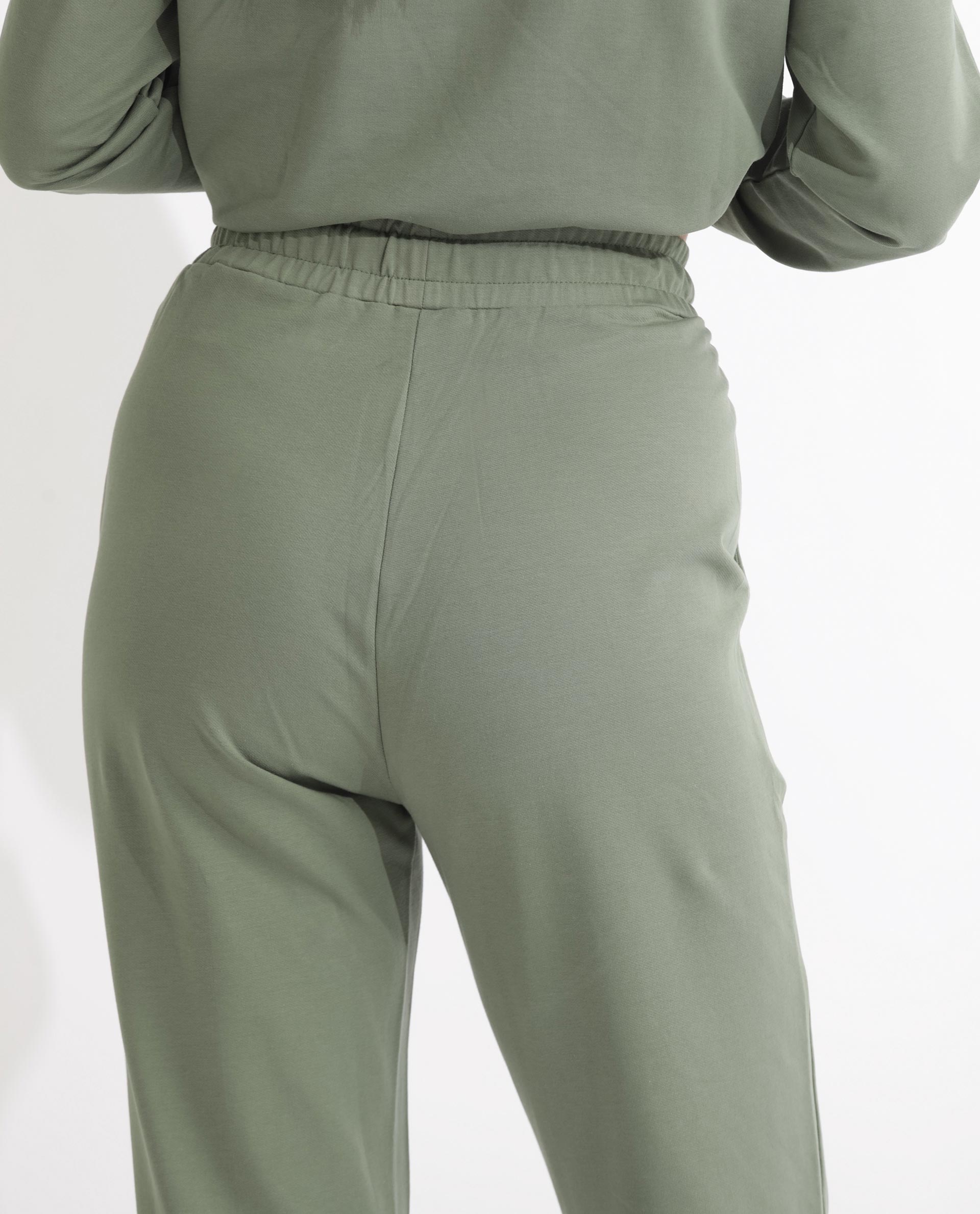 Rareism Women Terac Dusky Green Cotton Lycra Fabric Regular Fit Solid Mid Rise Ankle Length Track Pant