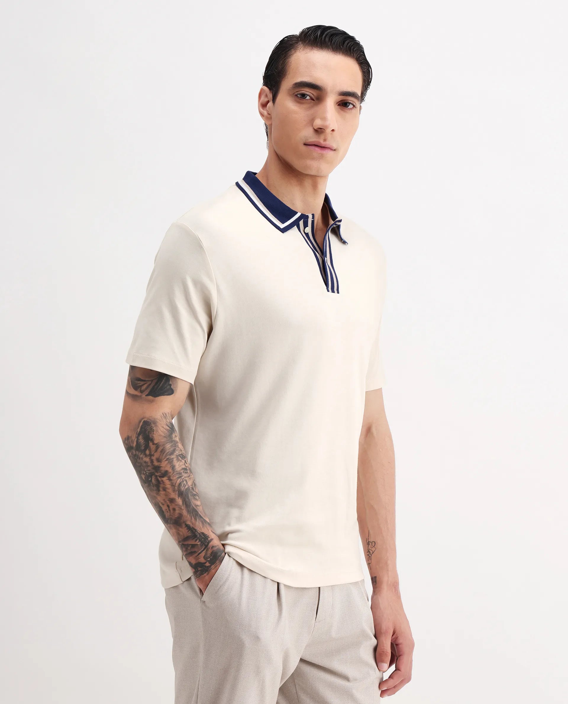 Rare Rabbit Men's Territ Pastel Yellow Cotton Plain Regular Fit Half Sleeve Polo