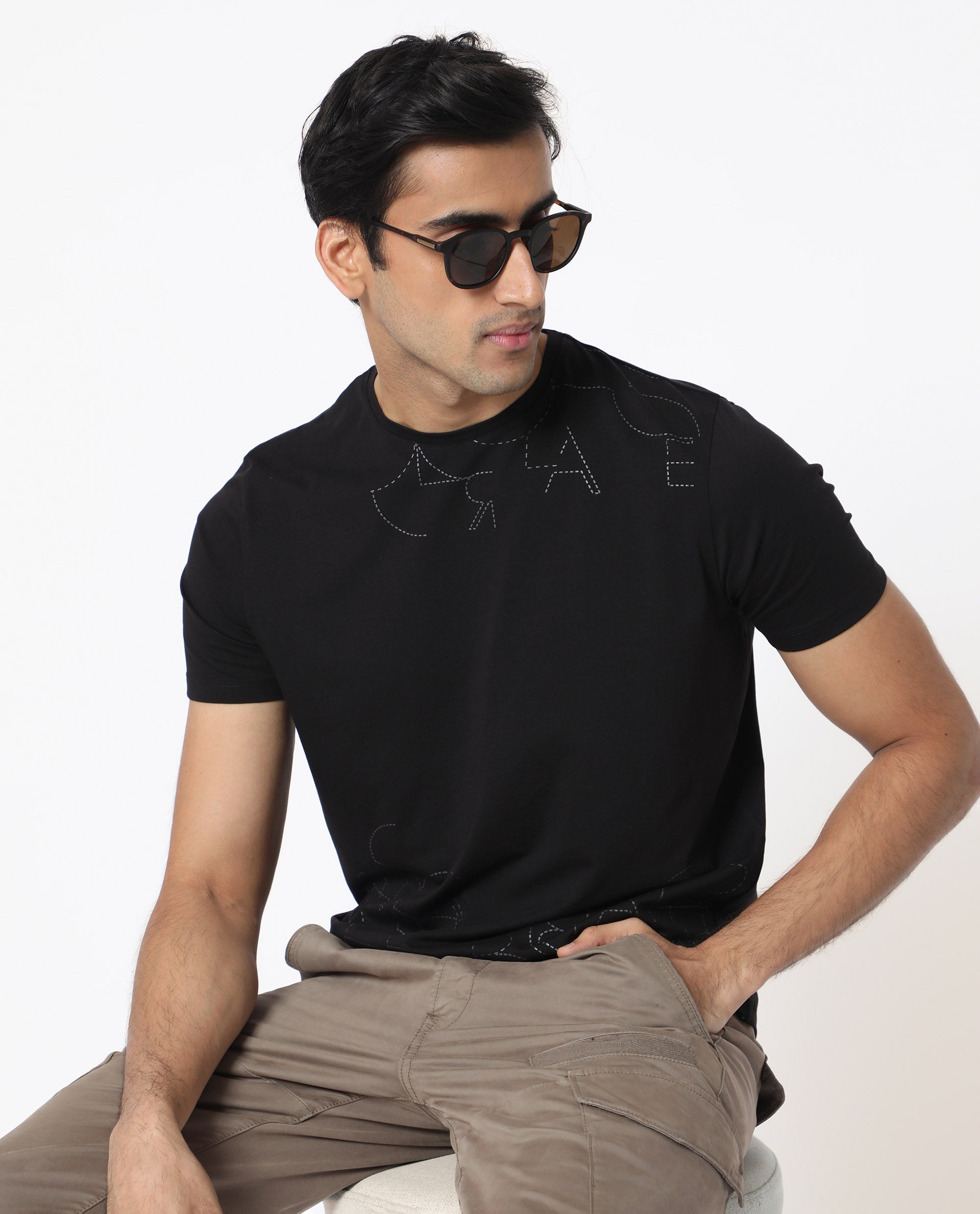 Rare Rabbit Men's Tona Black Crew Neck Half Sleeves Regular Fit Monogram Placement Print T-Shirt