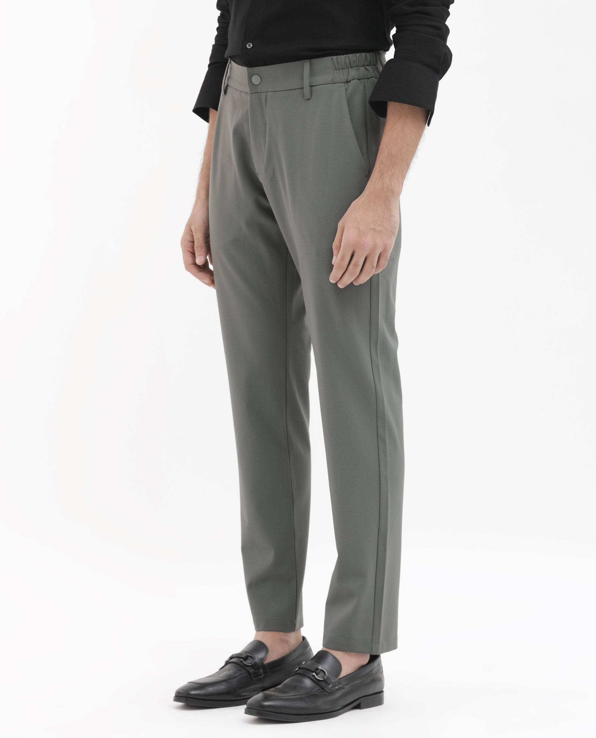 Rare Rabbit Men's Travel-24 Green Poly Viscose Lycra Fabric Blend Solid Trousers