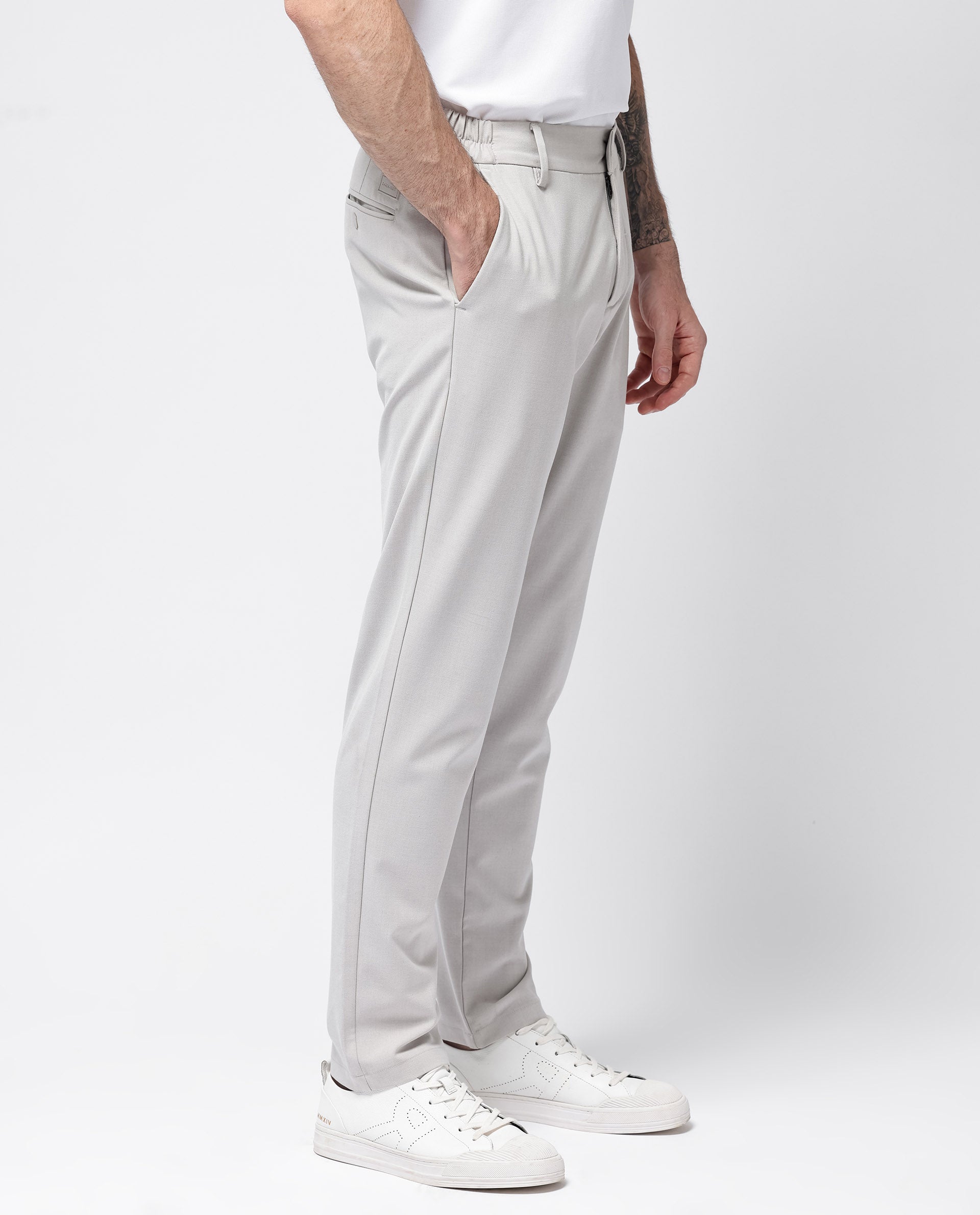 Rare Rabbit Men's Travel-24 Light Beige Poly Viscose Lycra Fabric Blend Solid Trousers