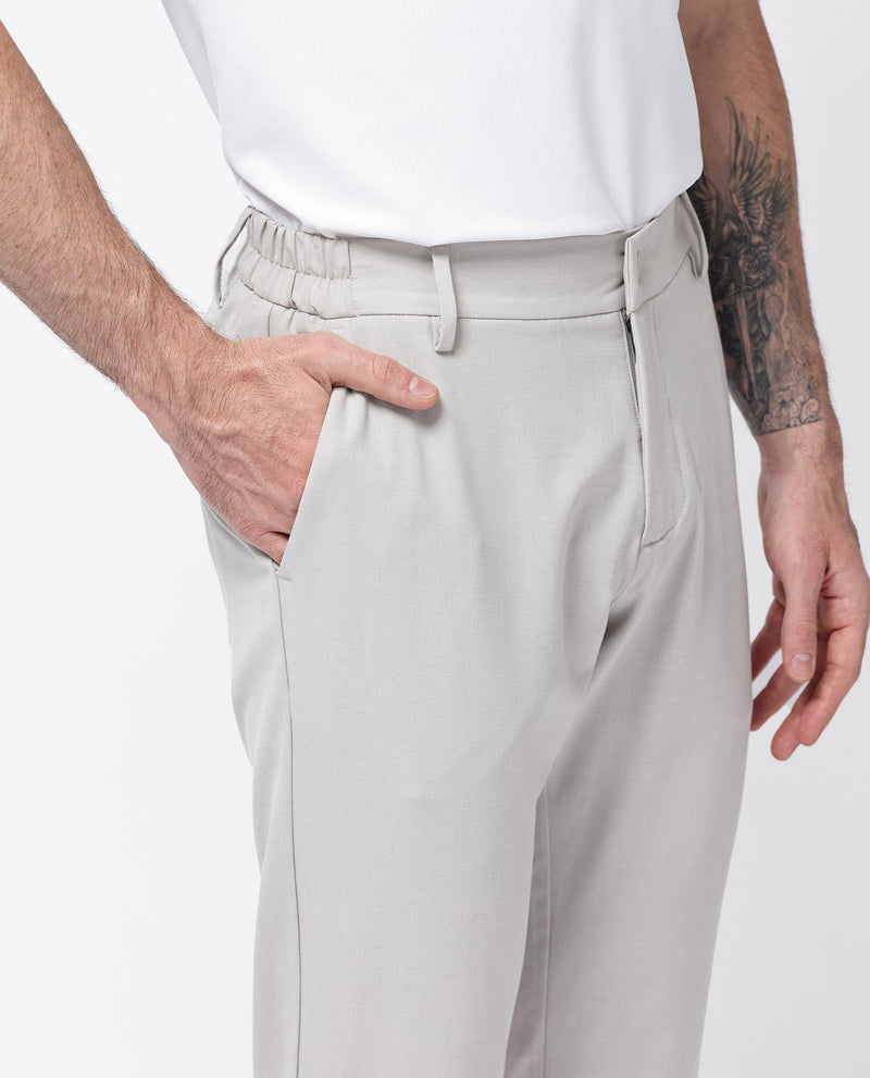 Rare Rabbit Men's Travel-24 Light Beige Poly Viscose Lycra Fabric Blend Solid Trousers