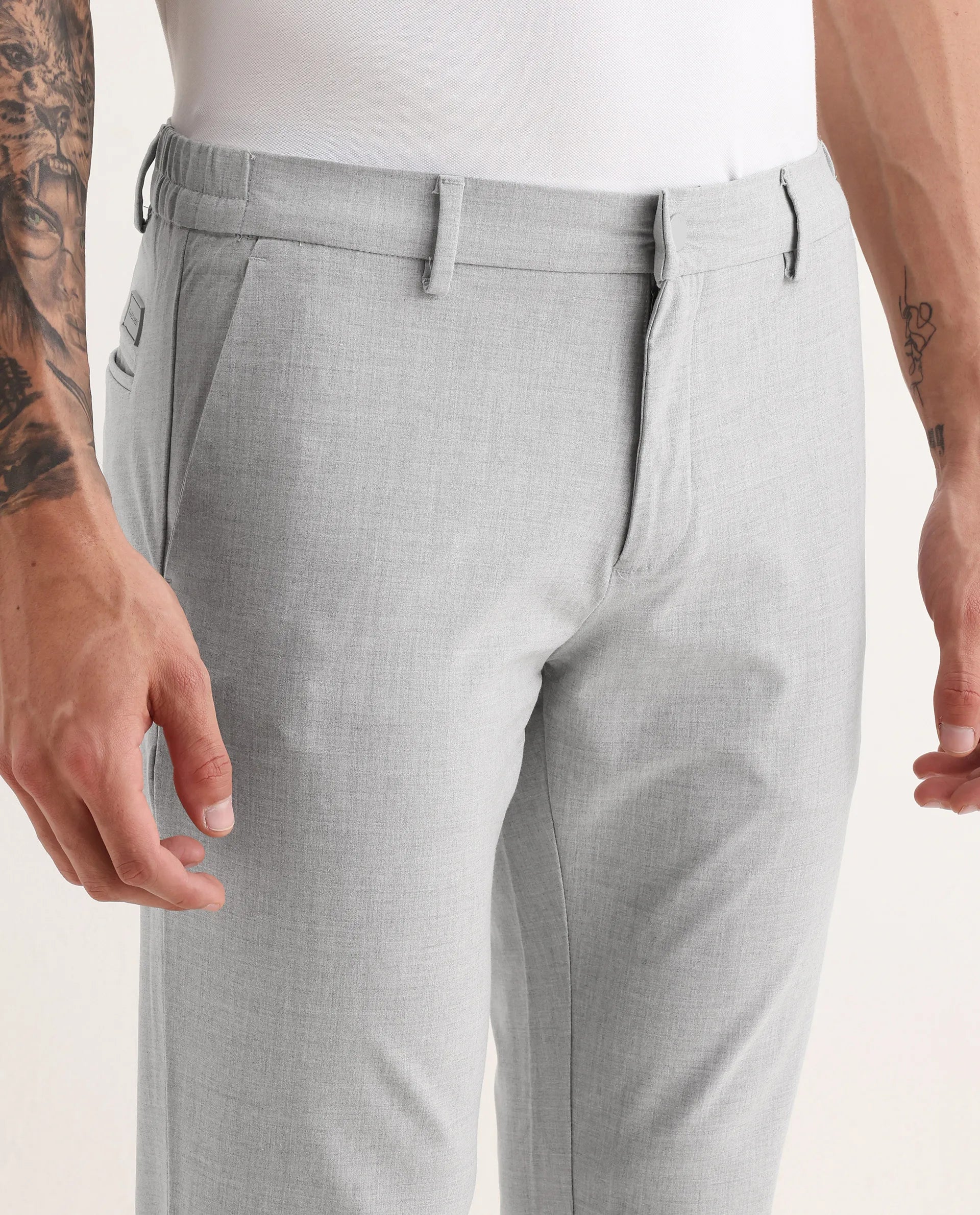 Rare Rabbit Men's Travellers Light Grey Solid Mid-Rise Regular Fit Trouser