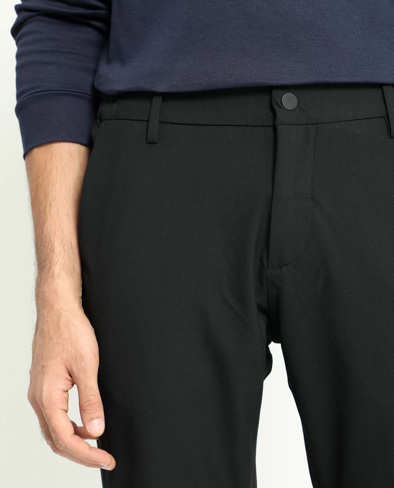 Rare Rabbit Men's Traveller Black Solid Mid-Rise Regular Fit Trouser
