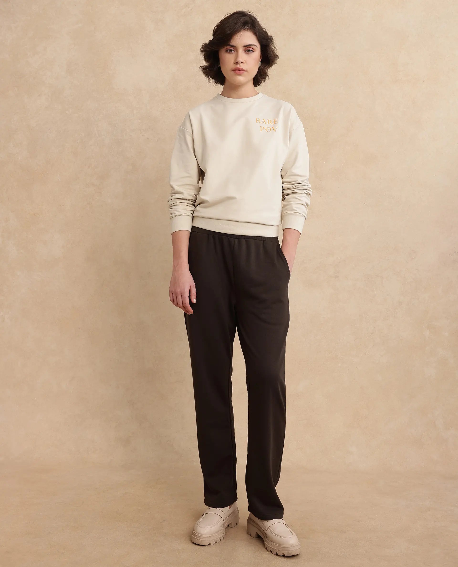 Rareism Women Trunky Brown Cotton Blend Fabric Straight Fit Ankle Length Plain Track Pant