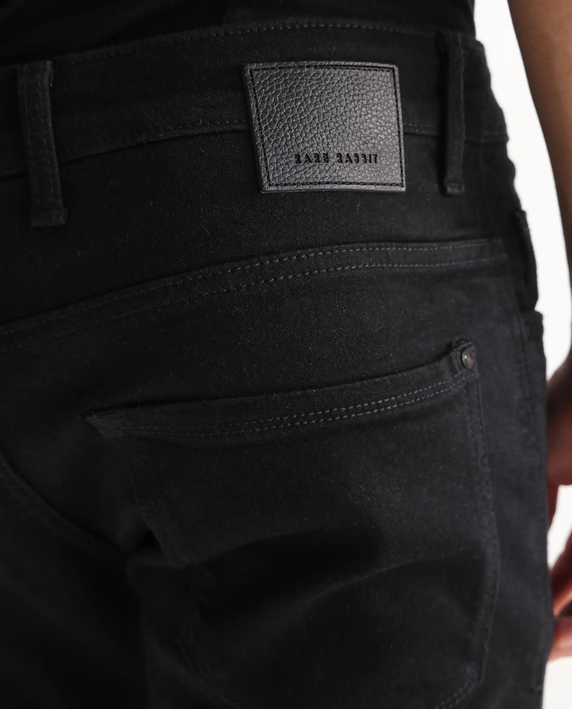 Rare Rabbit Men's Umo Black Cotton Blend Plain Hawk Slim Fit Jeans