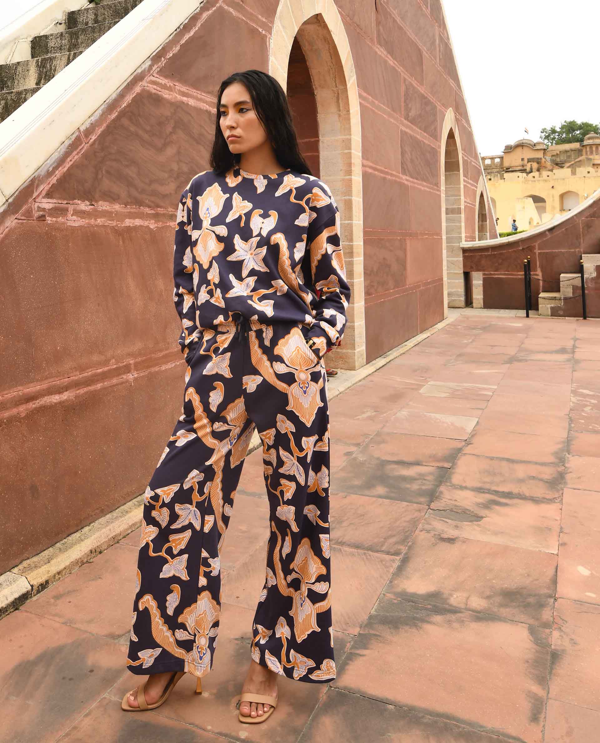 Rareism Women Bogota Navy Cotton Fabric Relaxed Fit Abstract Print Mid Rise Ankle Length Track Pant