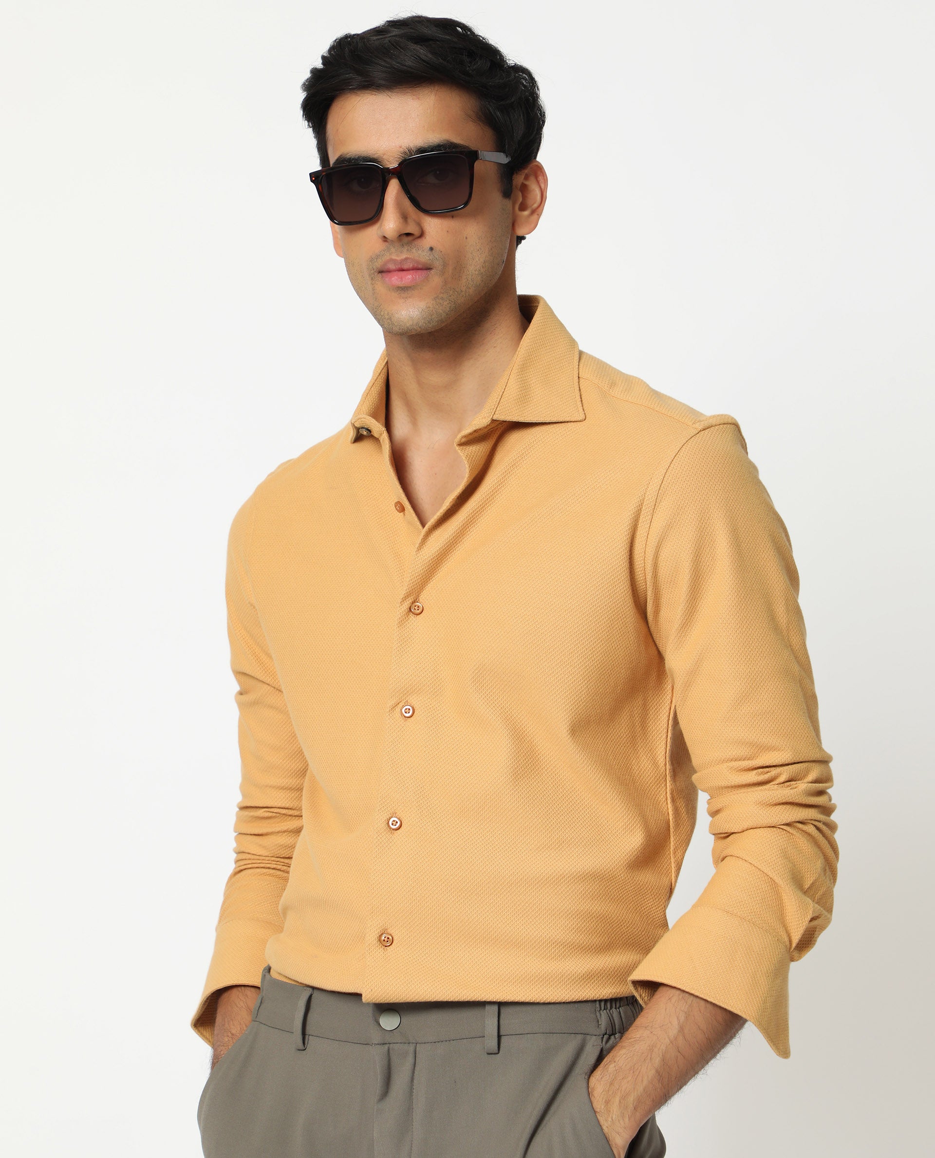 Rare Rabbit Men's Venziya Dark Yellow Cotton Knitted Fabric Full Sleeves Solid Shirt