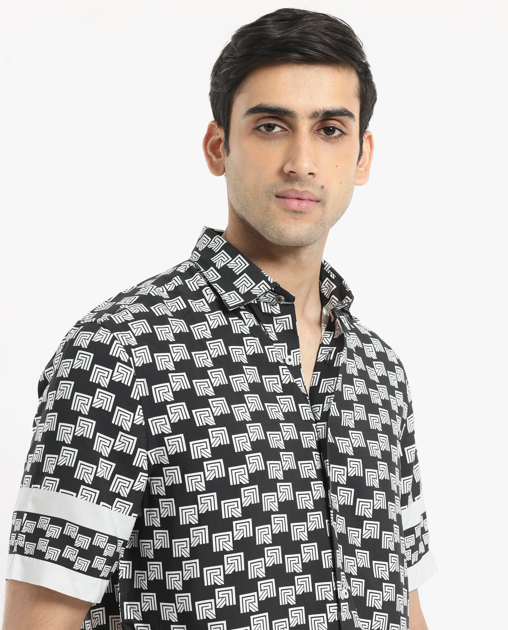Buy Vito - Black Boxy Fit Monogram Print Shirt| Rare Rabbit Buy Vito - Black Boxy Fit Monogram Print Shirt| Rare Rabbit